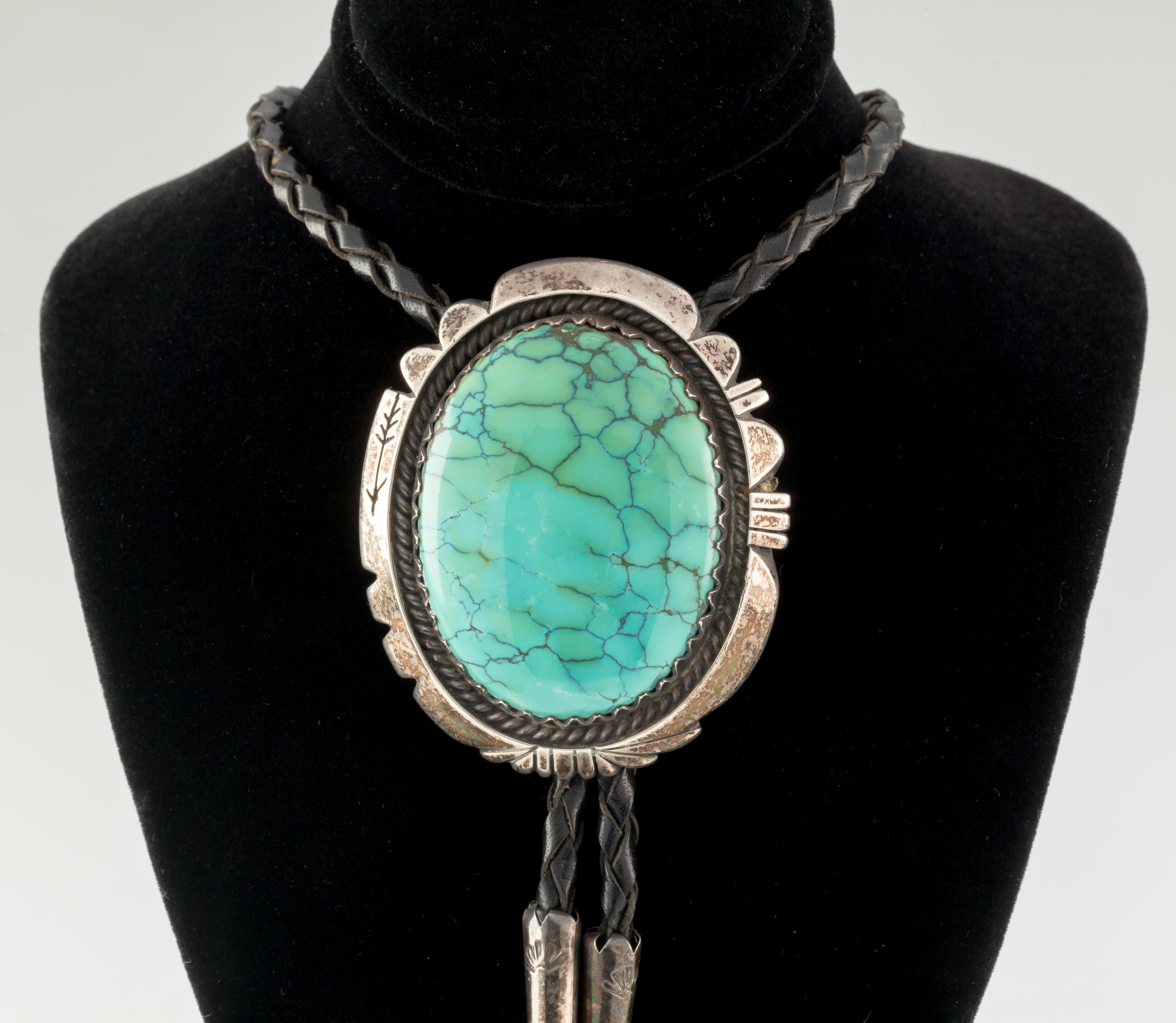 Beautiful Turquoise Bolo with Black Leather tie accented in Sterling 
Reverse Hallmark 