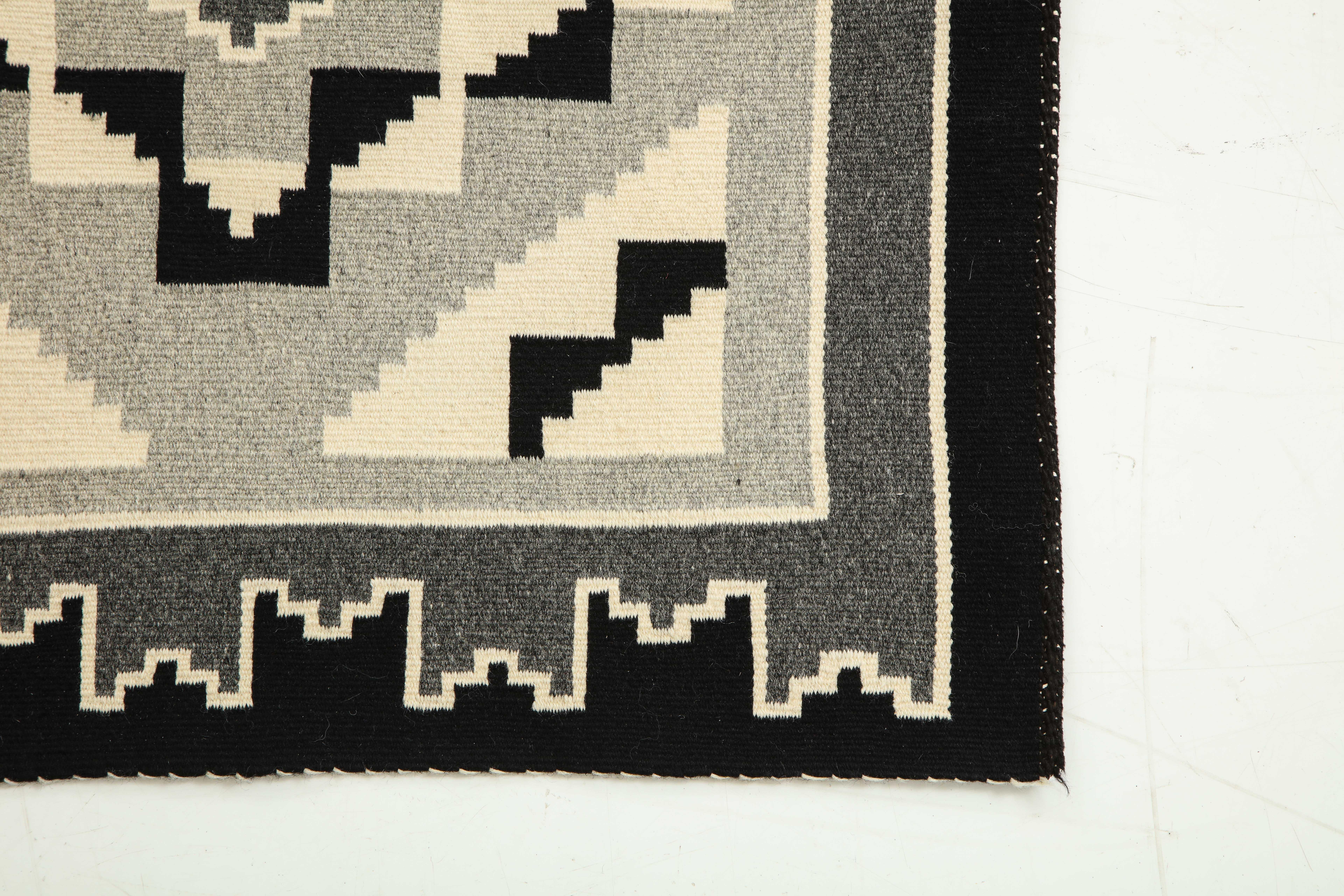 Vintage Navajo woven wool carpet/saddle blanket
Black, white and grey geometric design.