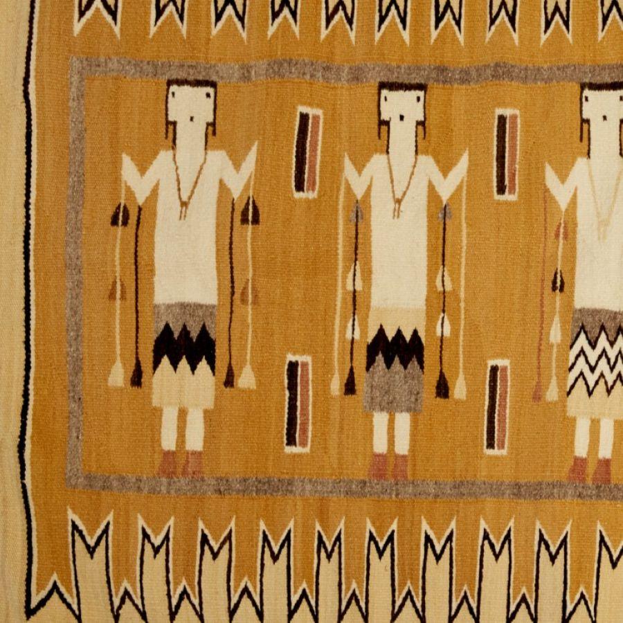 Navajo Yei Handwoven Wool Rug, American Southwest, 20th Century

Description:
A vibrant and finely handwoven Navajo Yei rug, originating from the American Southwest, likely mid-20th century. The design features five stylized Yei figures - Holy