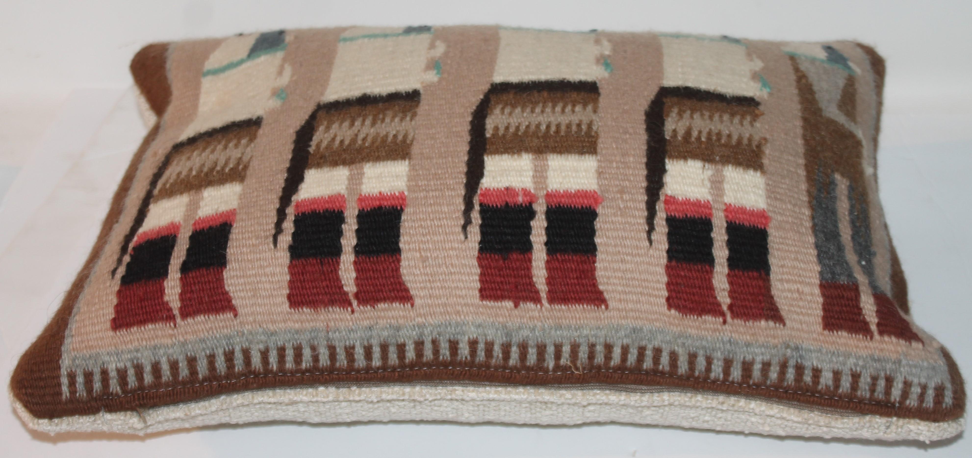 Vintage Navajo Yei rug custom made pillow. Feather and down insert.