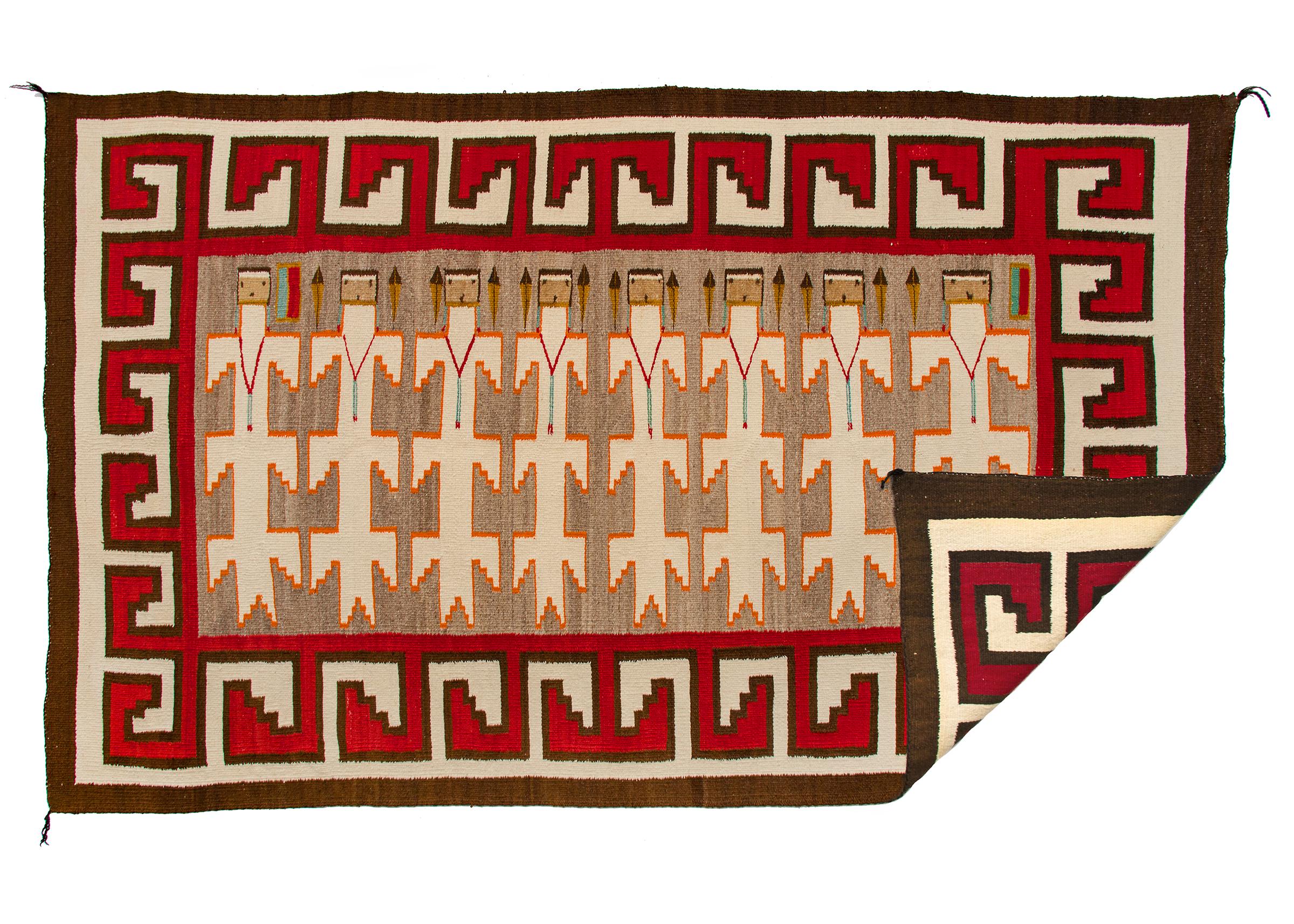 Antique/vintage 1930s Navajo pictorial weaving known as a Yei rug with 8 Yei figures, the Yeibichai or Talking Gods, are surrounded by a hooked border woven of native wool that was hand-carded, hand-spun and hand-woven by a Navajo weaver in colors
