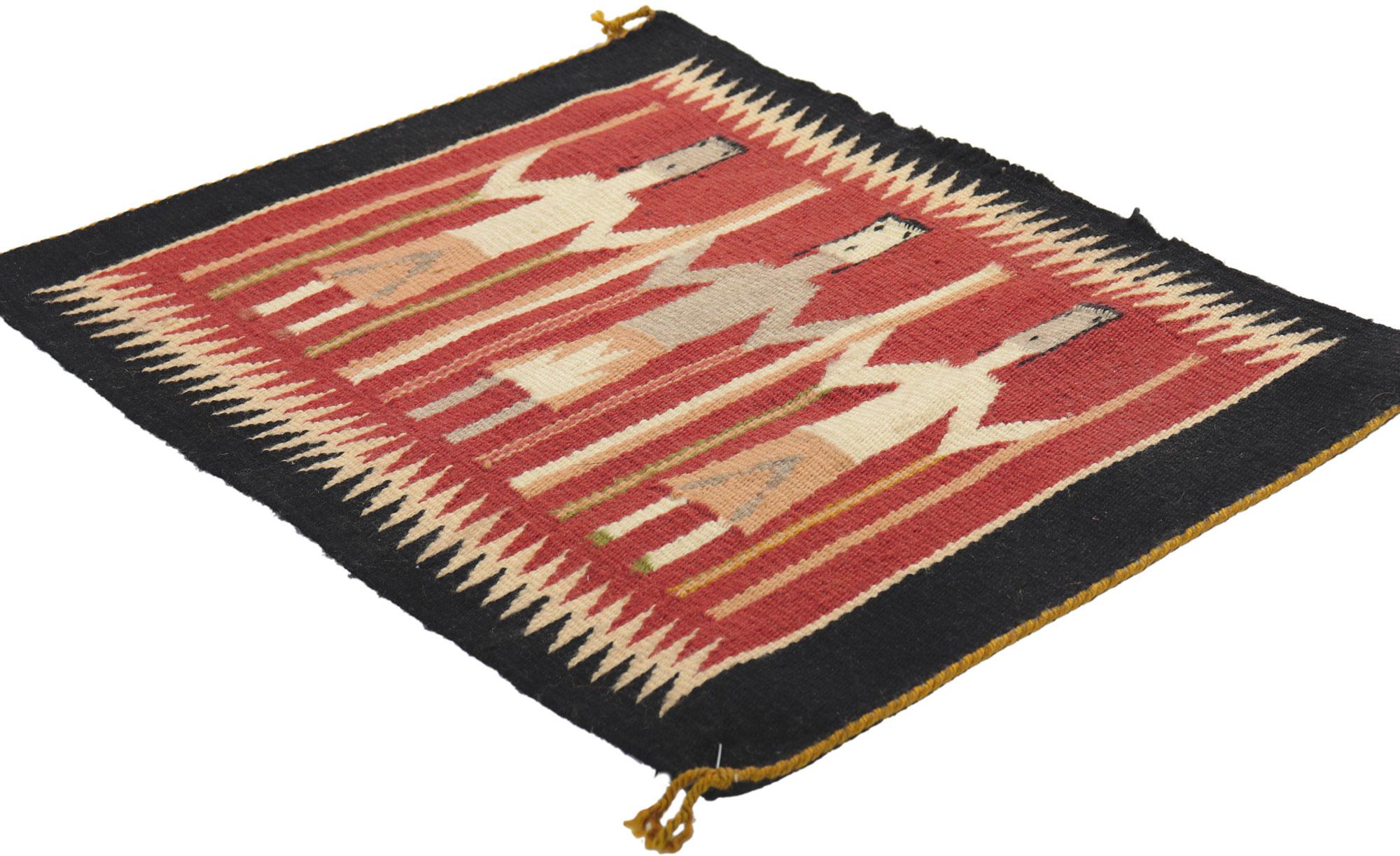 78426 Vintage Navajo Yeibichai Rug, 01'06 x 01'10.
Full of tiny details and a bold expressive design, this handwoven wool vintage Navajo Yeibichai rug is a captivating vision of woven beauty. The abrashed red field features three female Yei