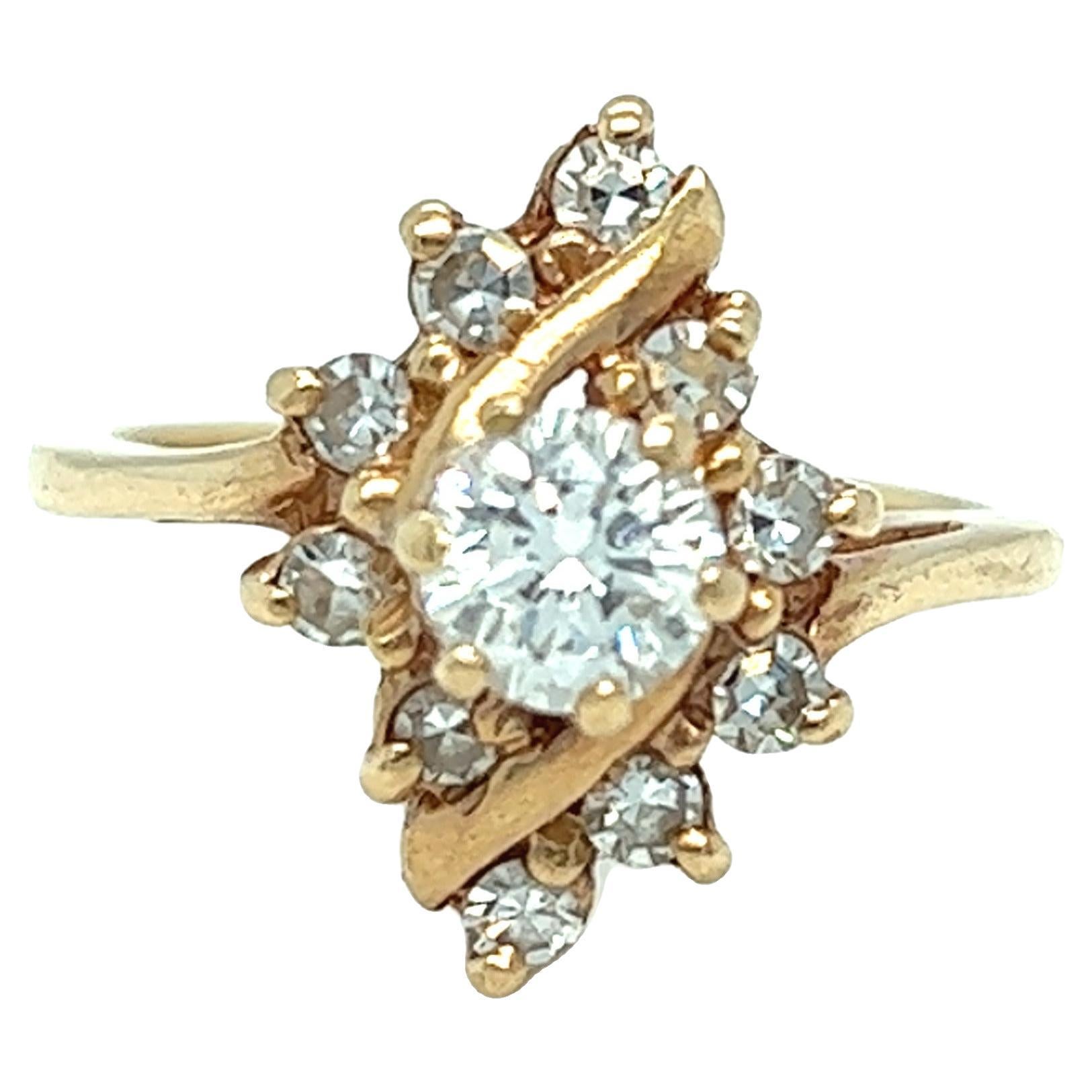 Bague vintage Navette Bypass en or jaune 14 carats et diamants