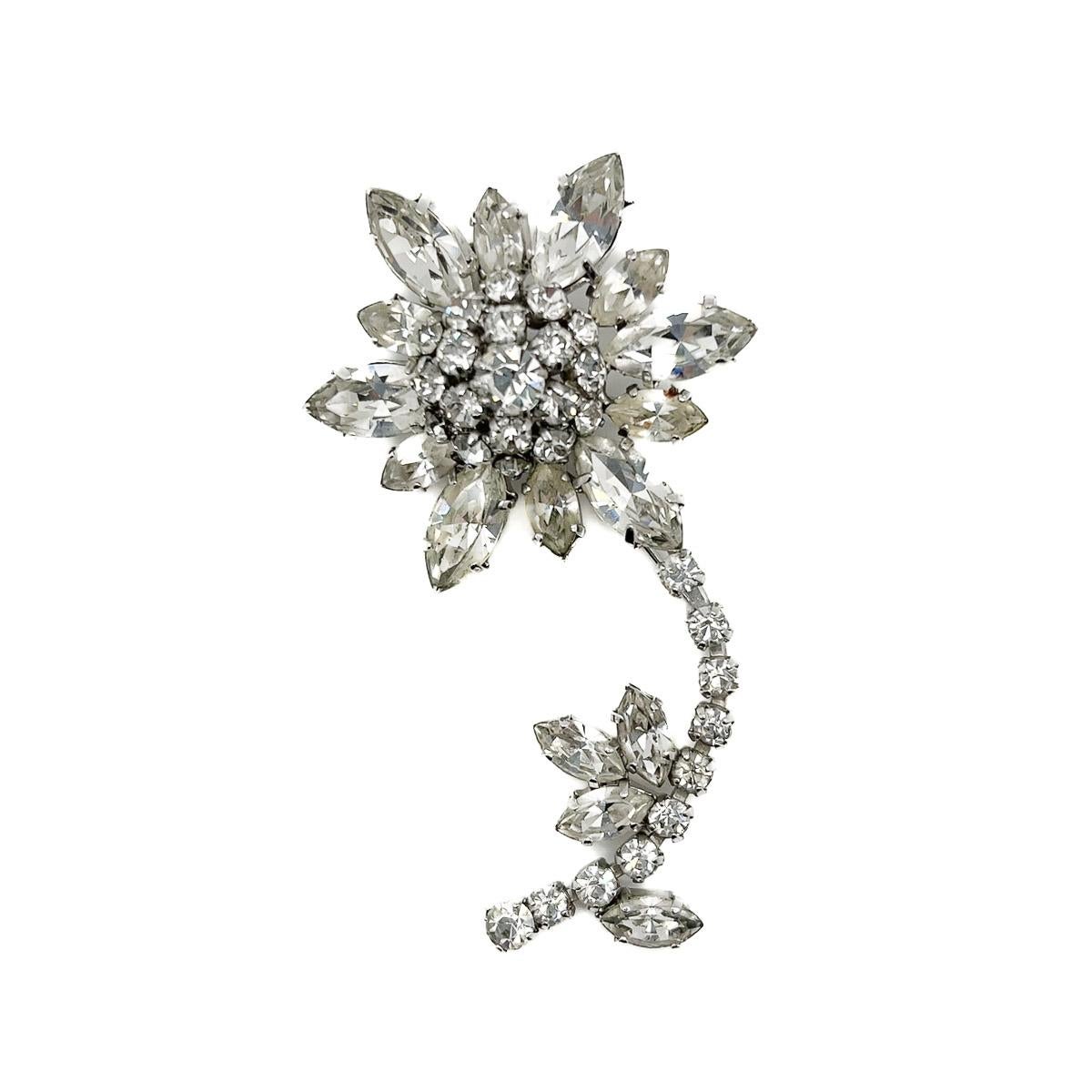 A gorgeous and utterly timeless Vintage Floral Crystal Brooch. Reminds us distinctly of the one featured in the storyline of Wham's Last Christmas video, and we are coveting the beautiful array of fancy cut navette crystal petals. With it's timeless