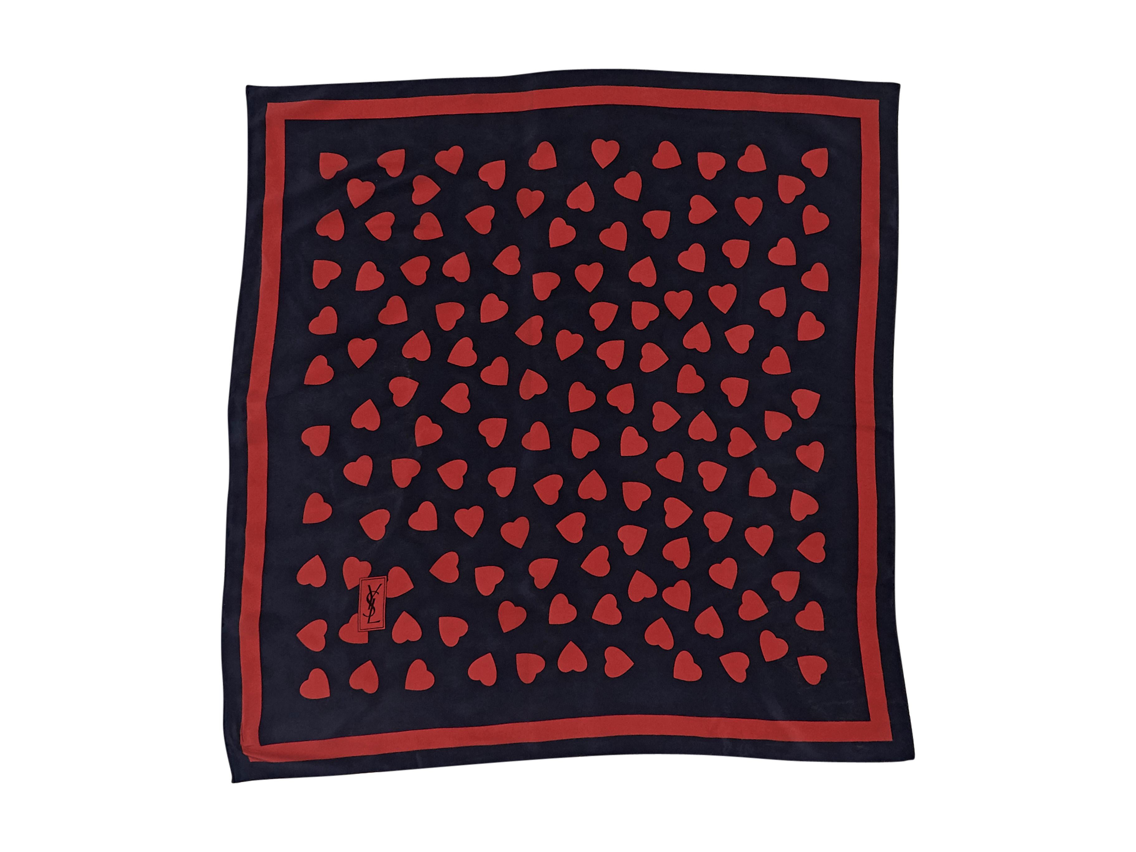 Product details:  Vintage navy and red heart printed silk scarf by Yves Saint Laurent. Style with a structured blazer. 26