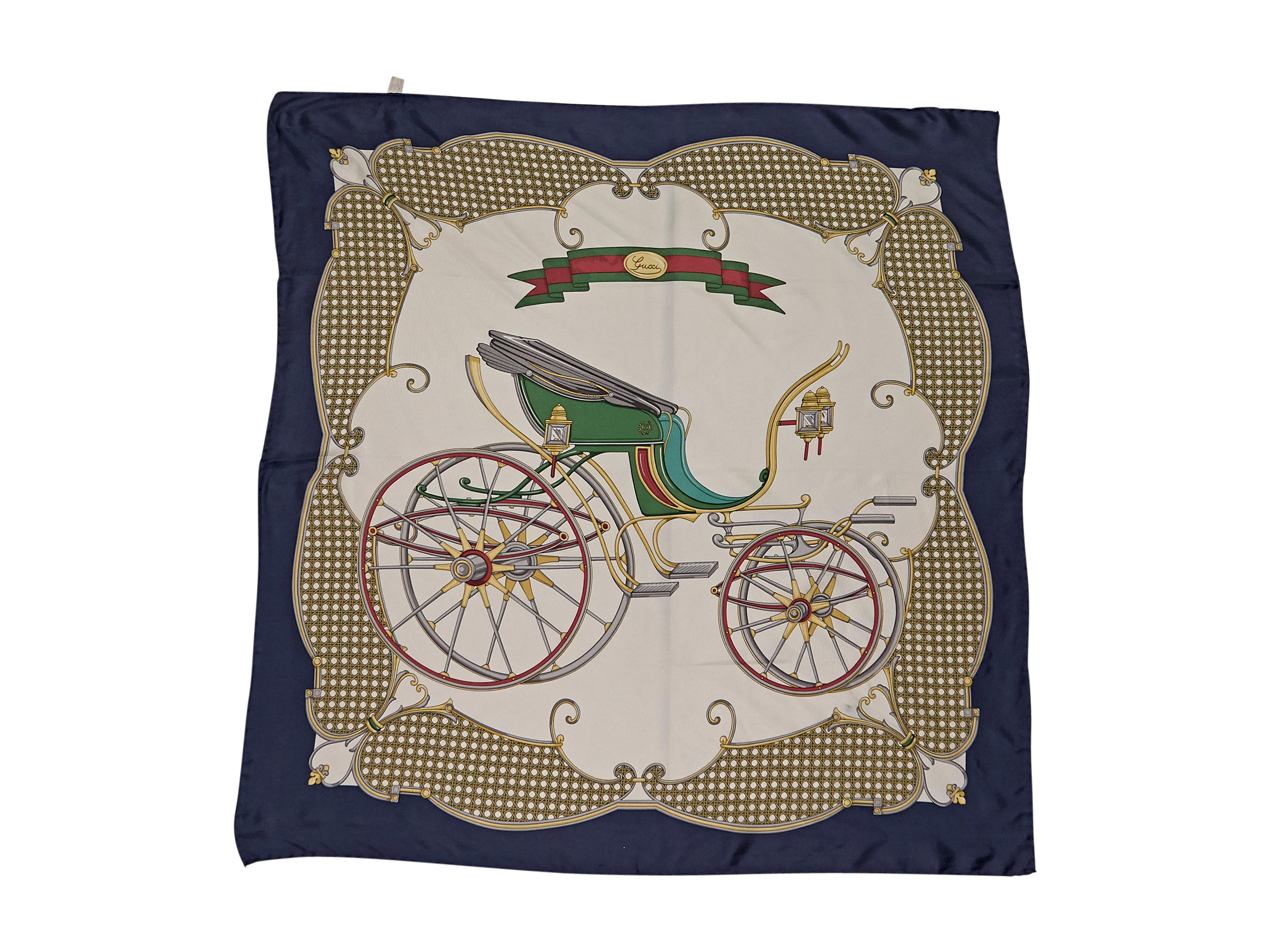 Product details:  Vintage navy and white multicolor Carriage printed silk scarf by Gucci. Wear tied around a loose bun. 34