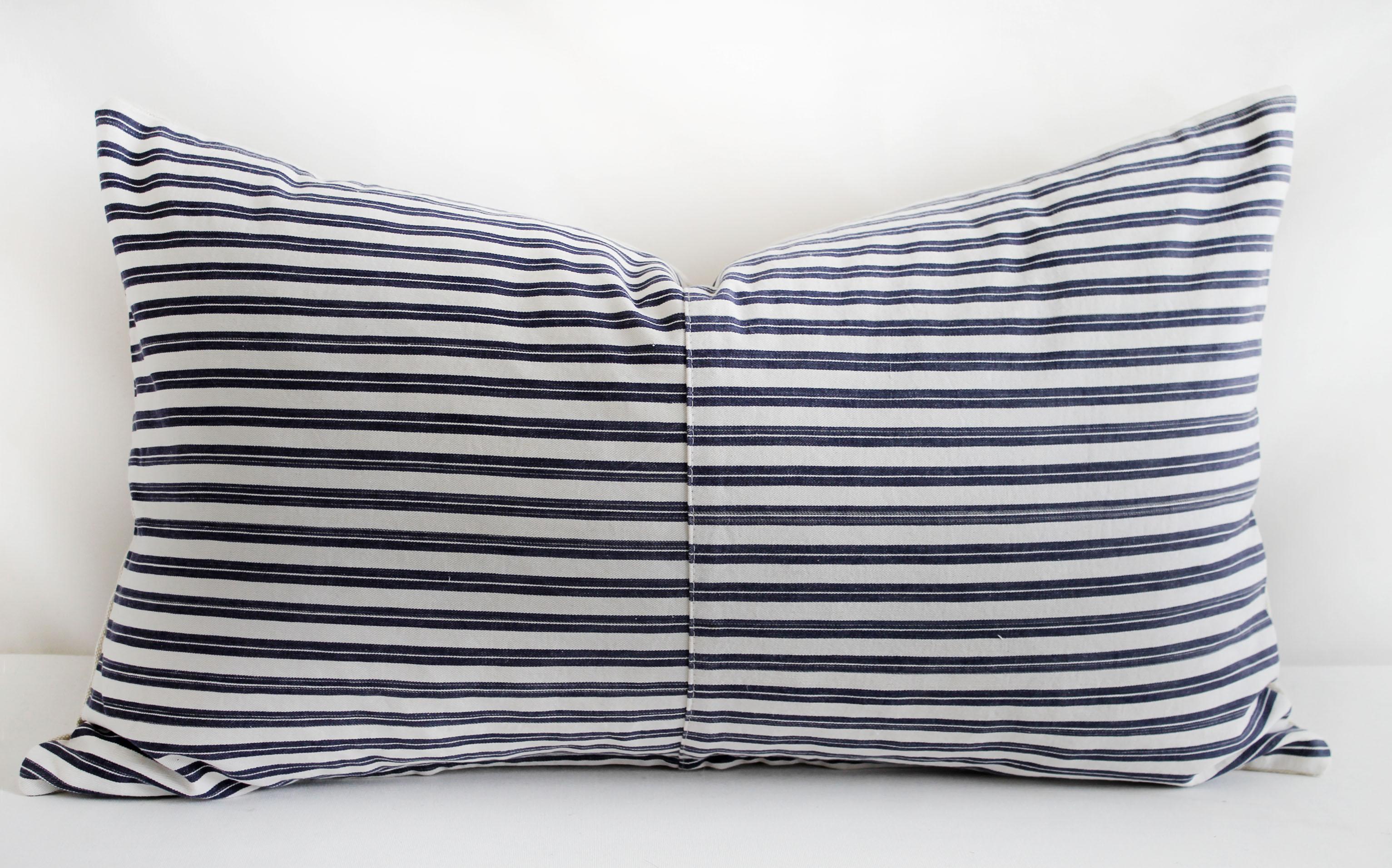 Vintage navy blue and white French ticking stripe lumbar pillow
The face is made from a vintage French textile in a navy blue an white ticking.
We have 2 available, this one shown has a seam in the center, the other is a solid face with no