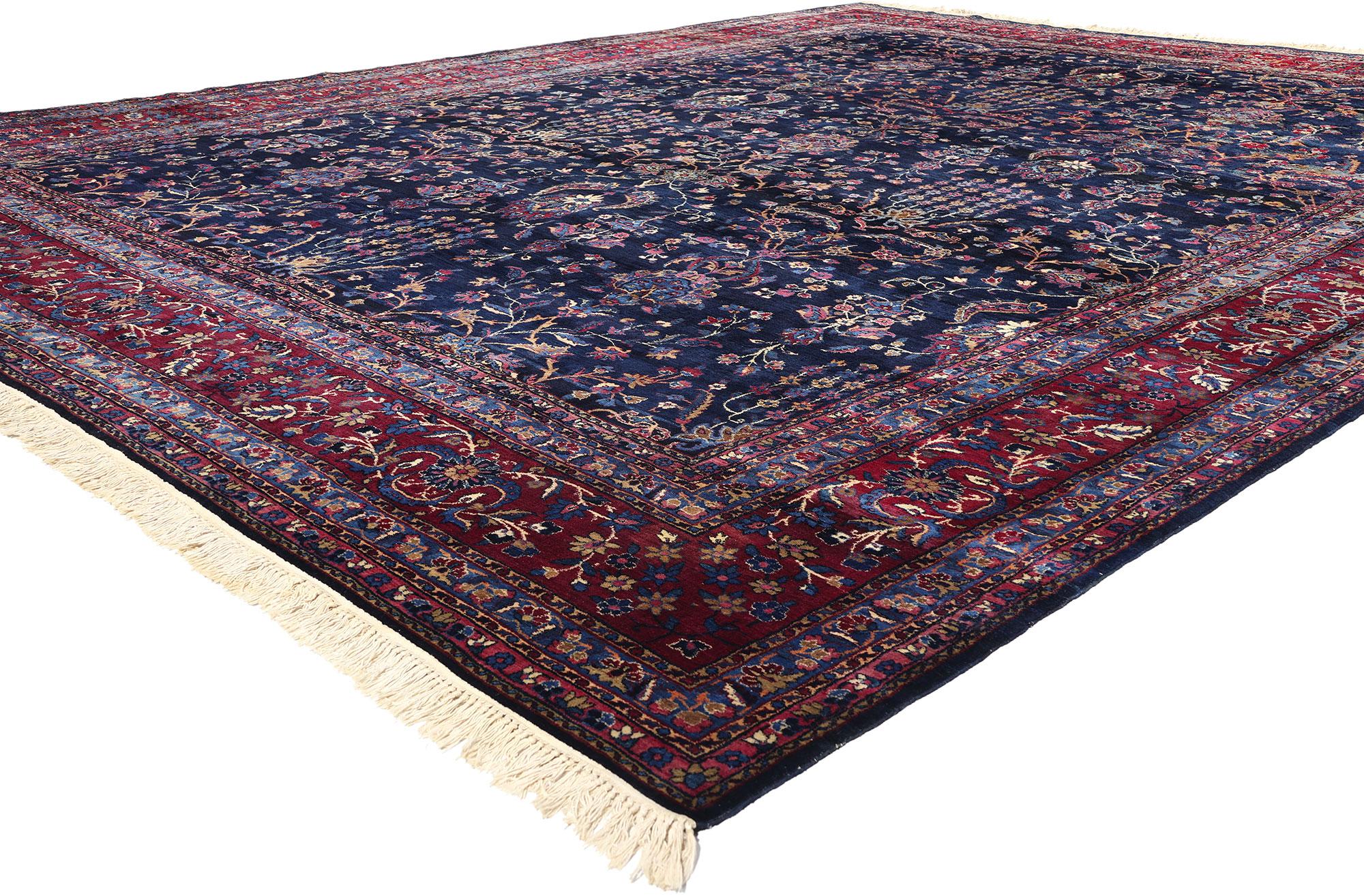 78760 Vintage Navy Blue Persian Kerman Rug, 11'09 x 15'05. Nestled in the heart of south-central Iran lies the origin of Kerman rugs, within the venerable city of Kerman itself. Renowned for centuries as a hub of weaving excellence, this bustling