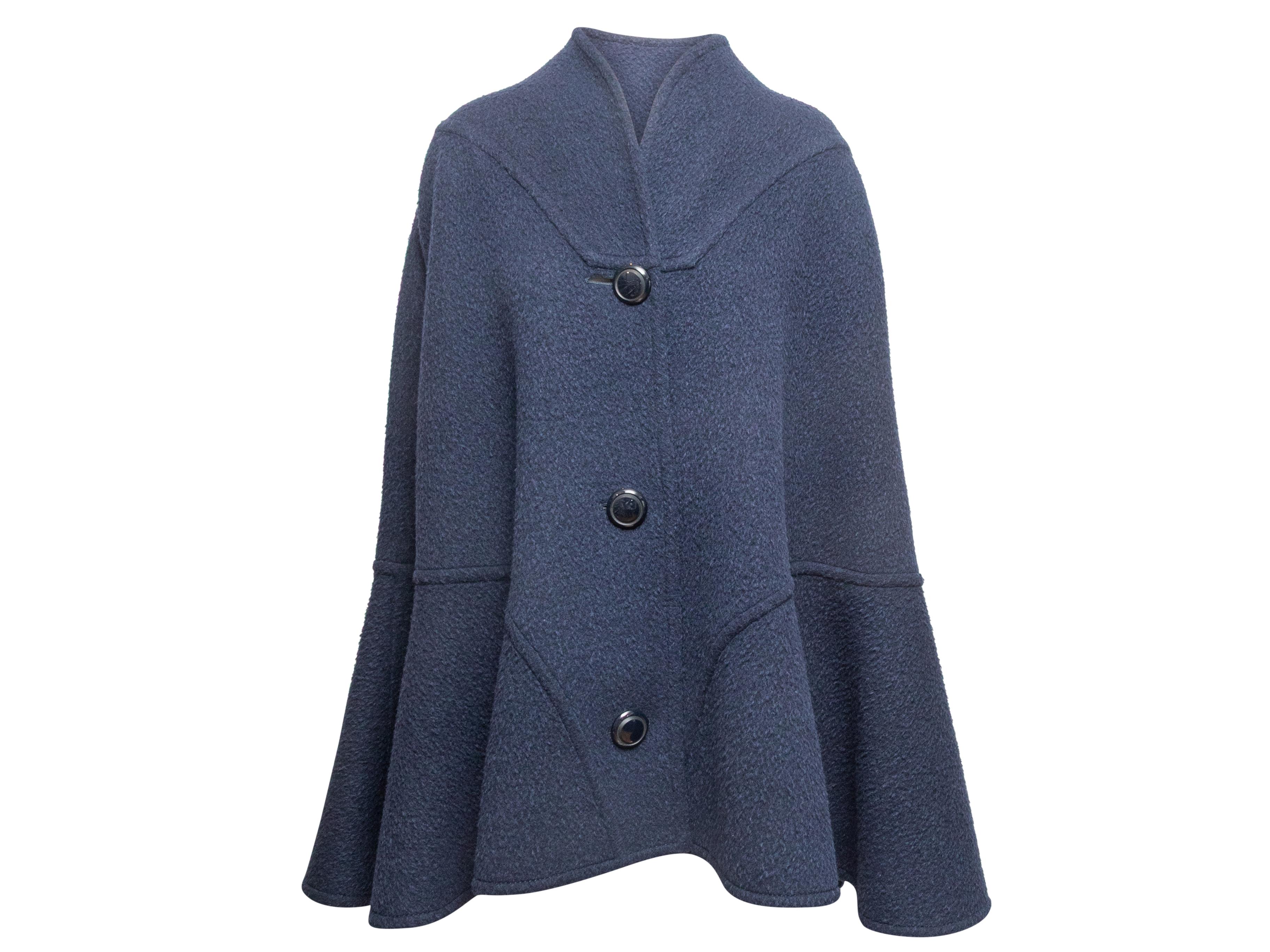 Berretto vintage in lana navy di Galanos. Scollo a V. Chiusura frontale con bottoni. Busto 58