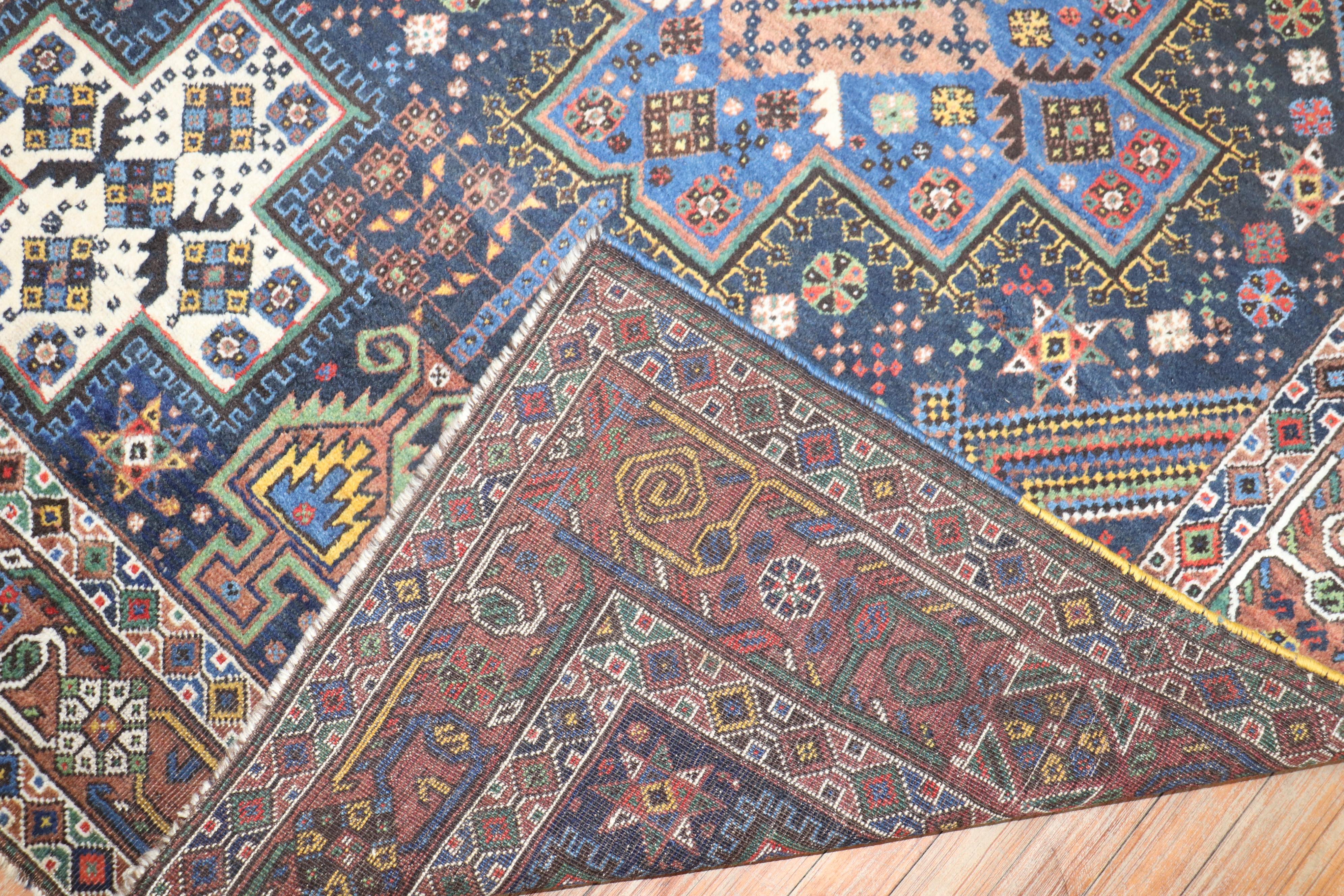 Vintage Northwest Persian square acccent size rug from the middle of the 20th Century

Measures: 5'2