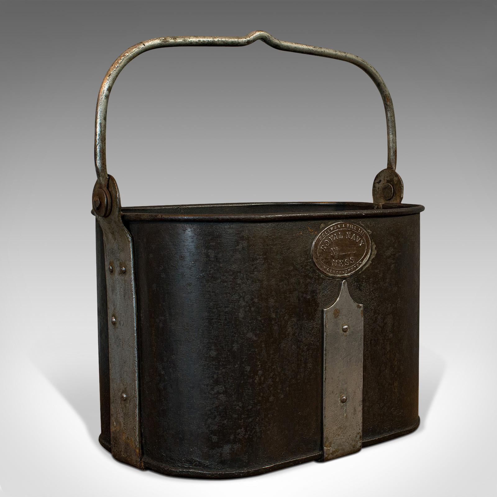 This is a vintage navy rum kettle. An English, steel container colloquially known as a 'mess fanny' and issued by Sellman & Hill Ltd, dating to the mid-20th century, circa 1950.

Fascinating example of Admiralty ware
Displays a desirable aged