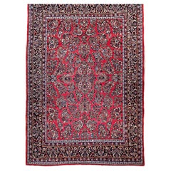 Sarouk persan vintage carré à motif floral sur toute sa surface rouge, bleu marine et ivoire