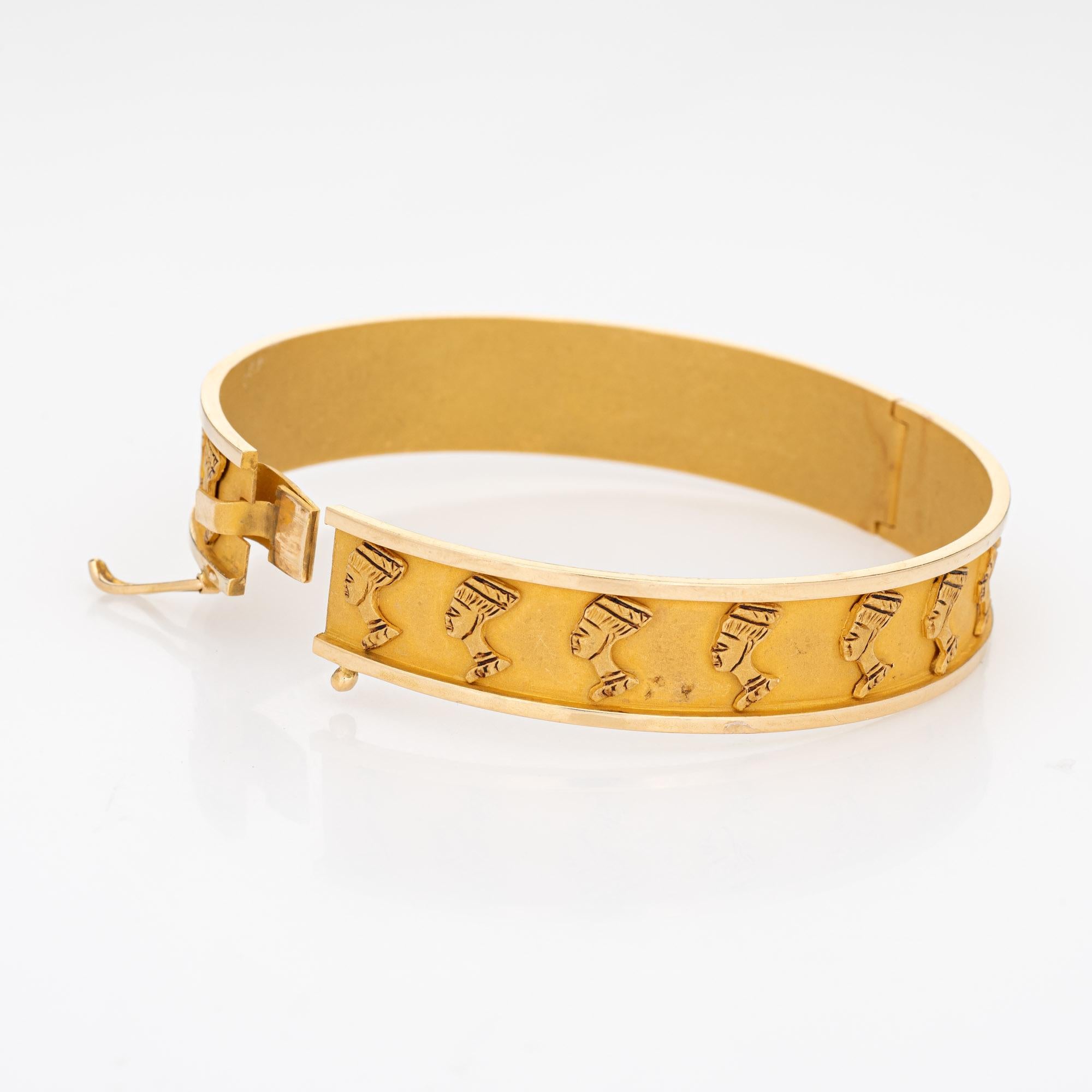 Stylish vintage Nefertiti bracelet crafted in 18k yellow gold.  

The distinct Egyptian themed bracelet features the bust of Nefertiti repeating around the entire circumference of the bracelet. The matte finish allows for a muted gold effect. The