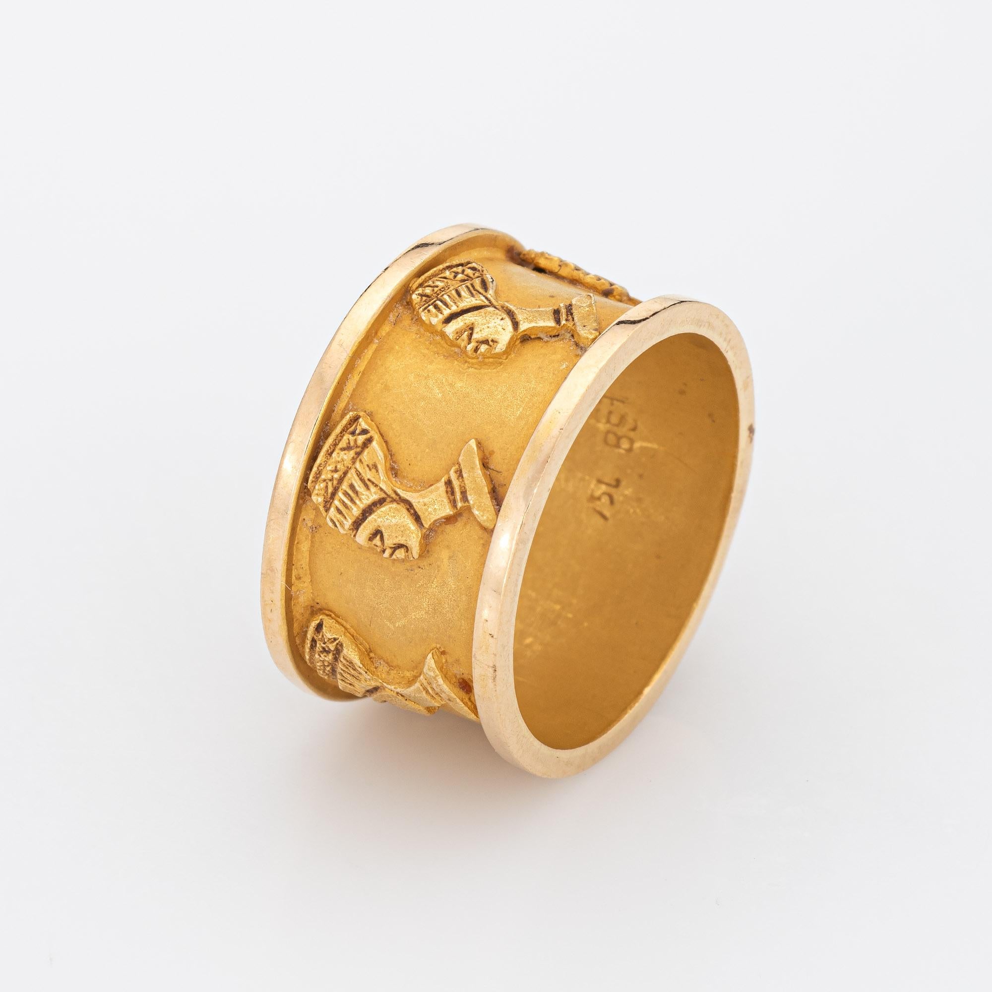 Stylish vintage Nefertiti eternity ring crafted in 18 karat yellow gold. 

The distinct Egyptian themed ring features the bust of Nefertiti repeating around the entire circumference of the ring. The matte finish allows for a muted gold effect. The