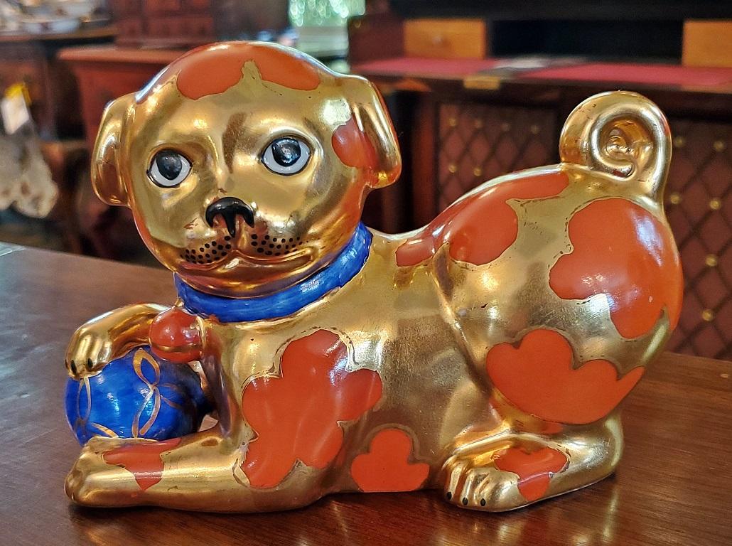 Presenting a beautiful vintage Neiman Marcus dog.

Mid-20th century … circa 1940–1950. Made of gilded ceramic.

From the Neiman Marcus Xmas Catalog and marked as “Made Exclusively for Neiman Marcus”.

It also has a paper label from a previous