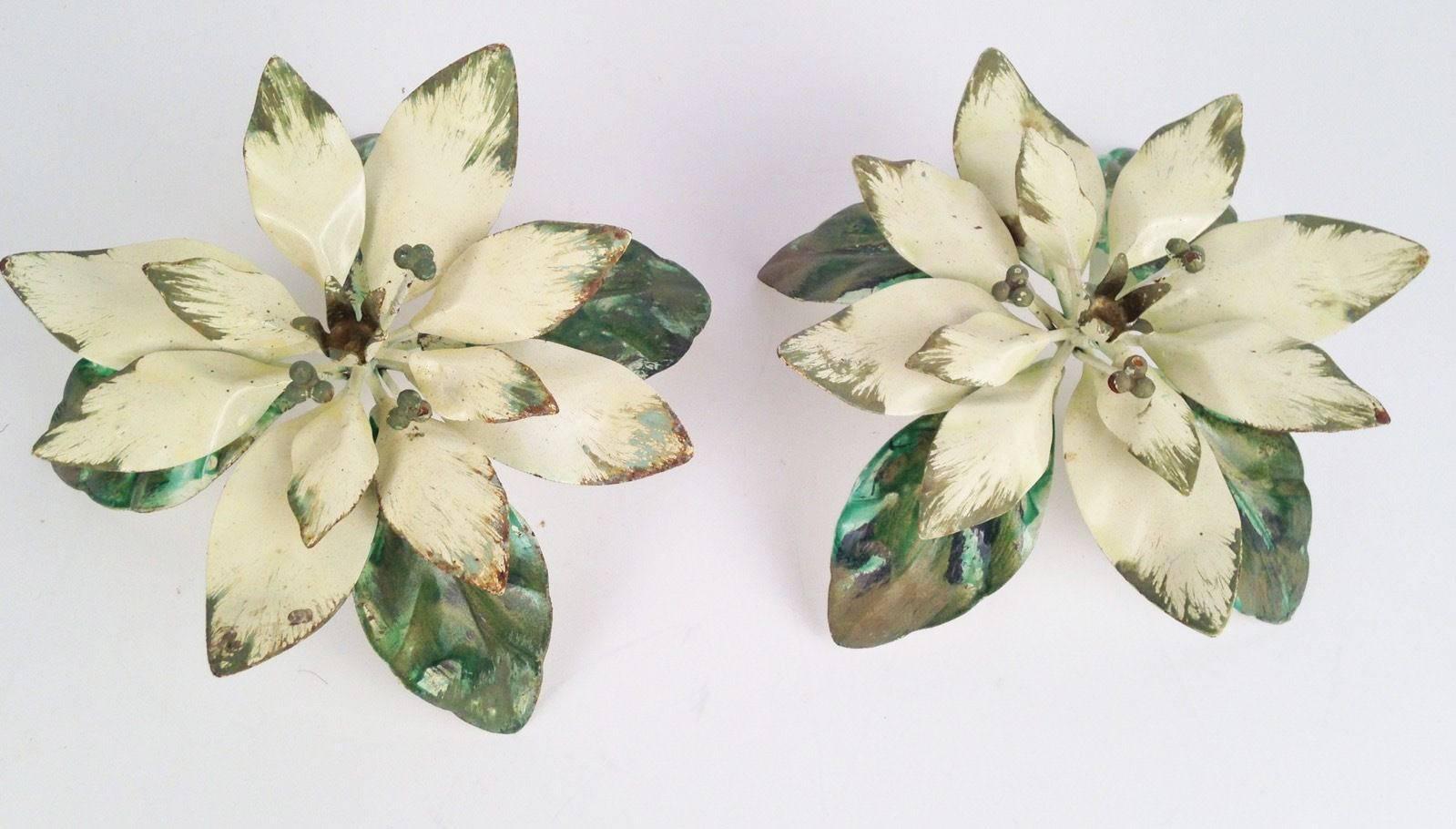 Stunning pair of shabby vintage metal tole flower candleholders made in Italy by Neiman Marcus.
Pair is in beautiful vintage condition and still holds the original Neiman Marcus Made in Italy sticker on underside. 
The flowers and leaves are done