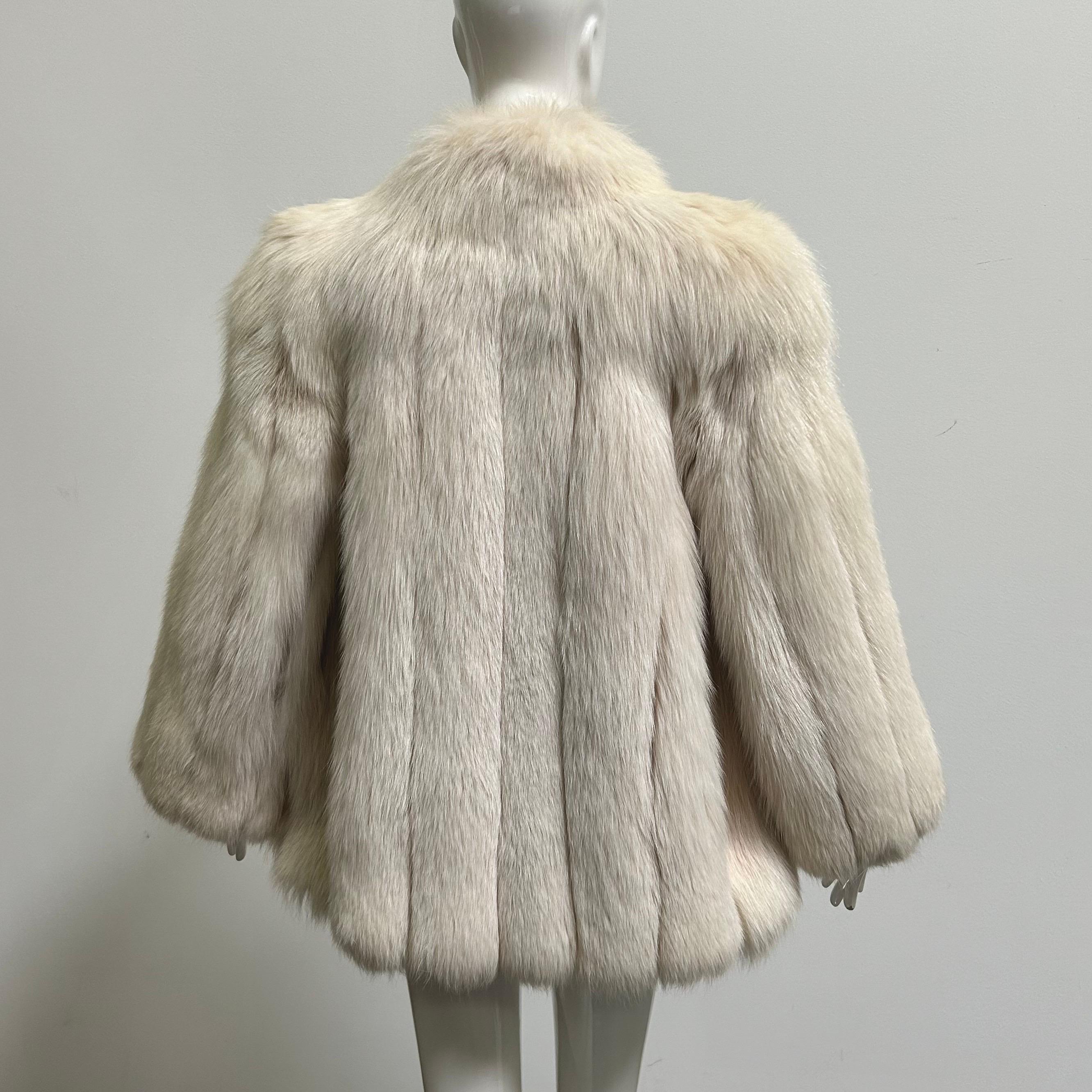 Stunning white Arctic fox fur jacket or coat by Neiman Marcus. This fits like a modern size medium. The bust measures 36