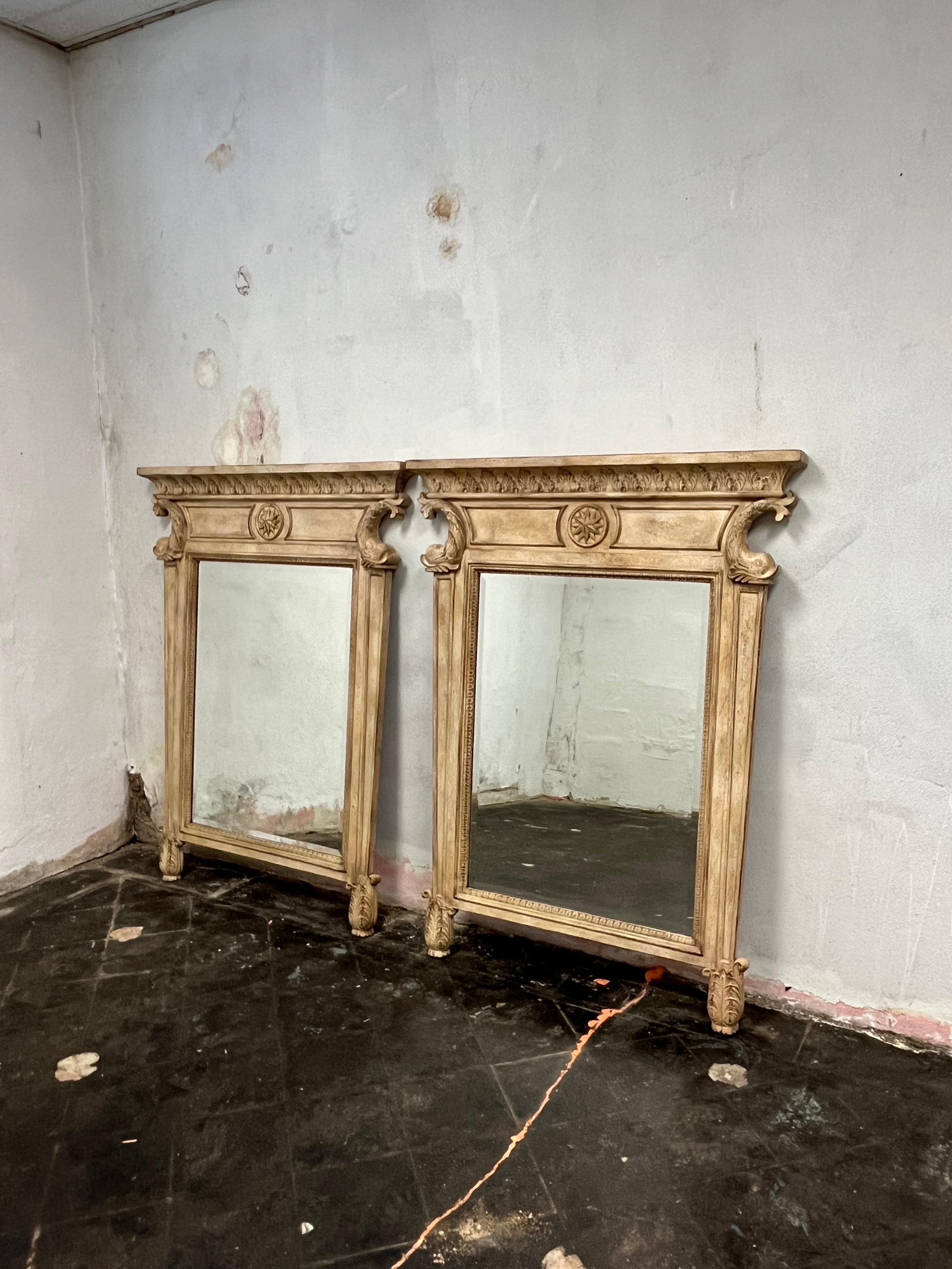 Spectacular pair of neoclassical mirrors with dolphin or fish and ancanthus detail. Imposing presence with mantle style top, center star flanked by dolphin fish. Nicely tapered design with acanthus leaves.
Curbside to NYC/Philly $450