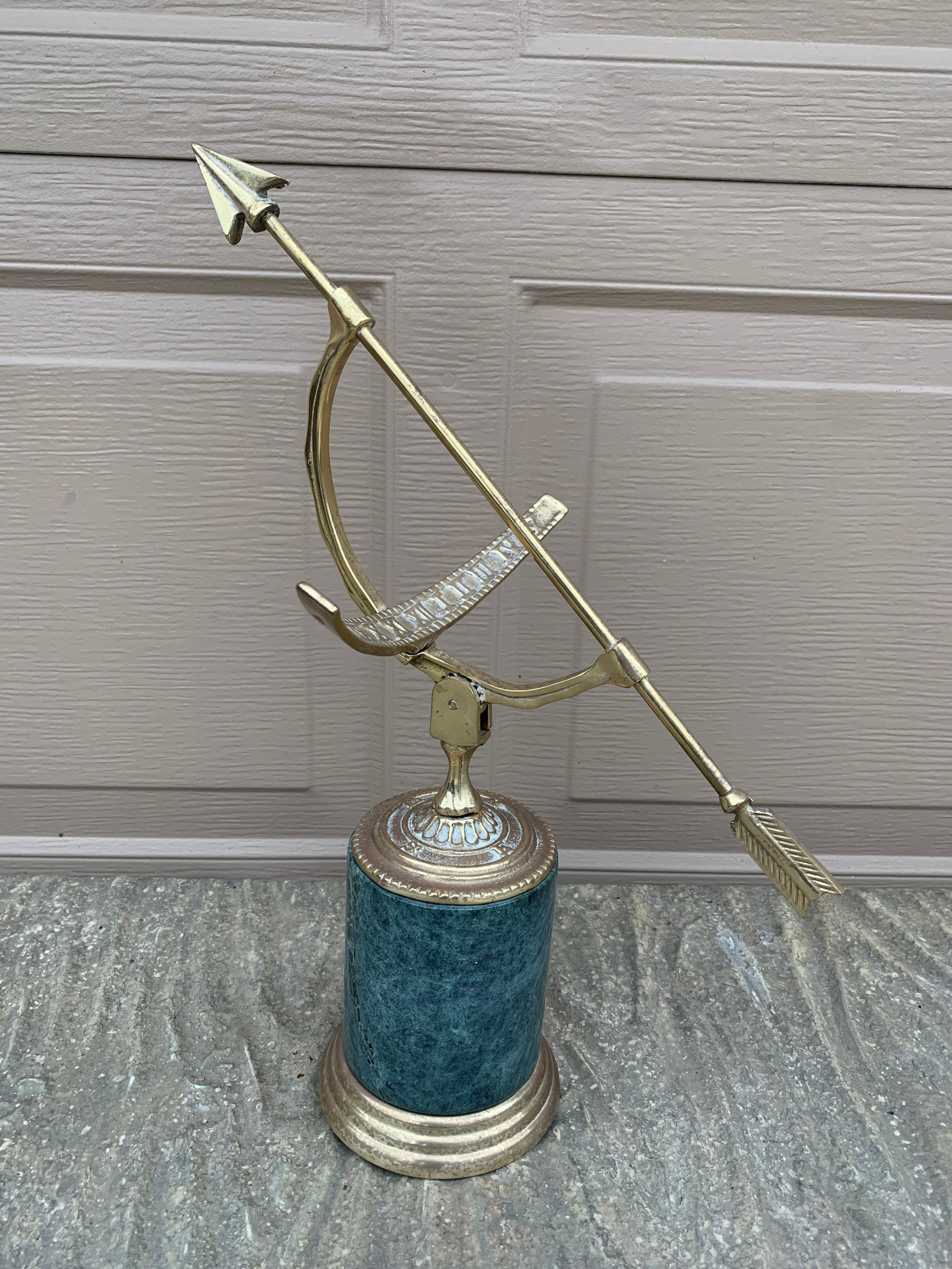 A stunning vintage French Provincial or Neoclassical style brass garden armillary sundial on a green marble base

USA, Late 20th Century

Measures: 11