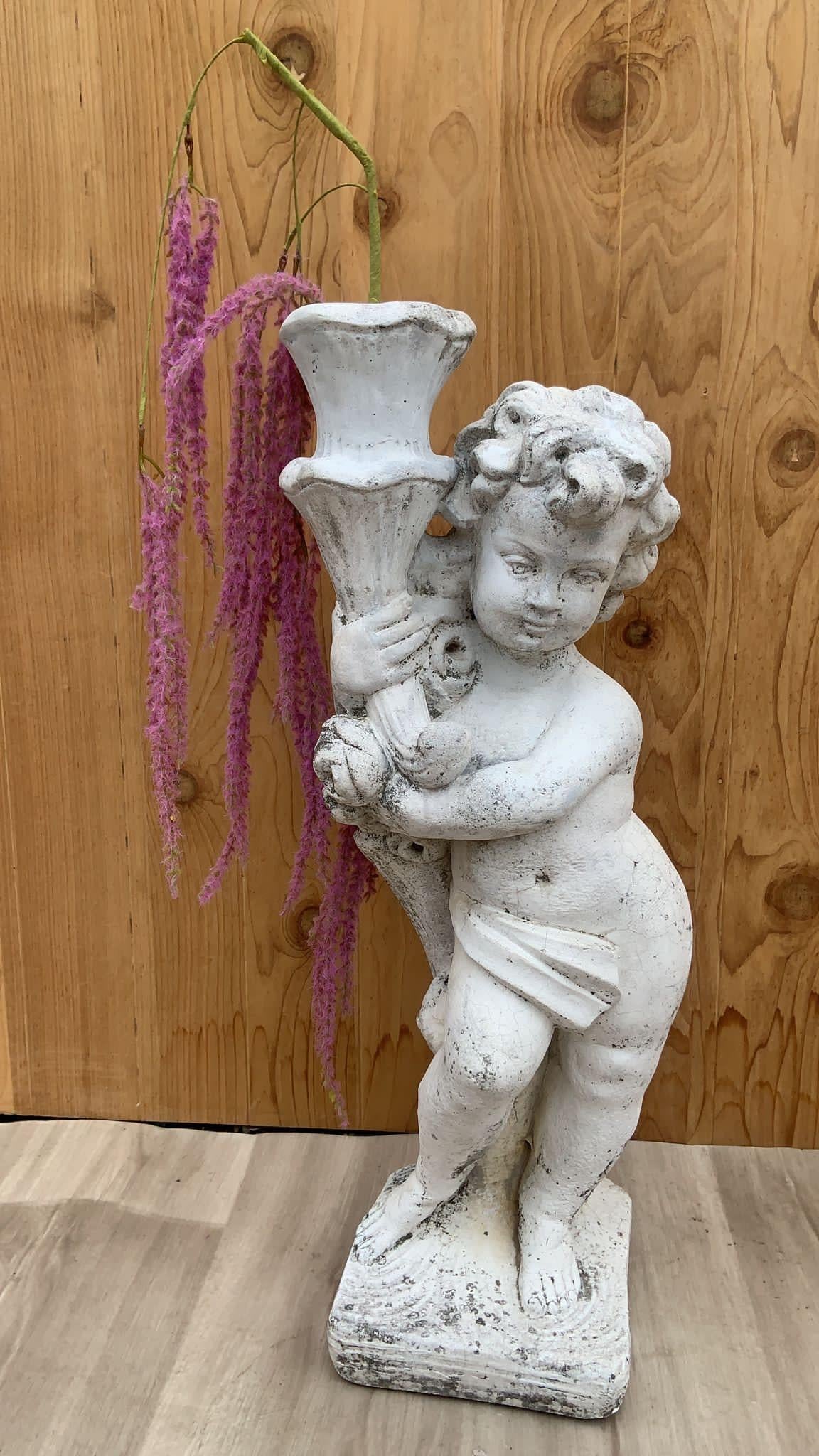 Vintage Neoclassical Cherub/Putti Garden Statue

From a beautiful Southern Estate, approximately 50 years old. Stunning, neoclassical cherubs/putti garden statue.

We have other different statues purchased from the same estate under separate