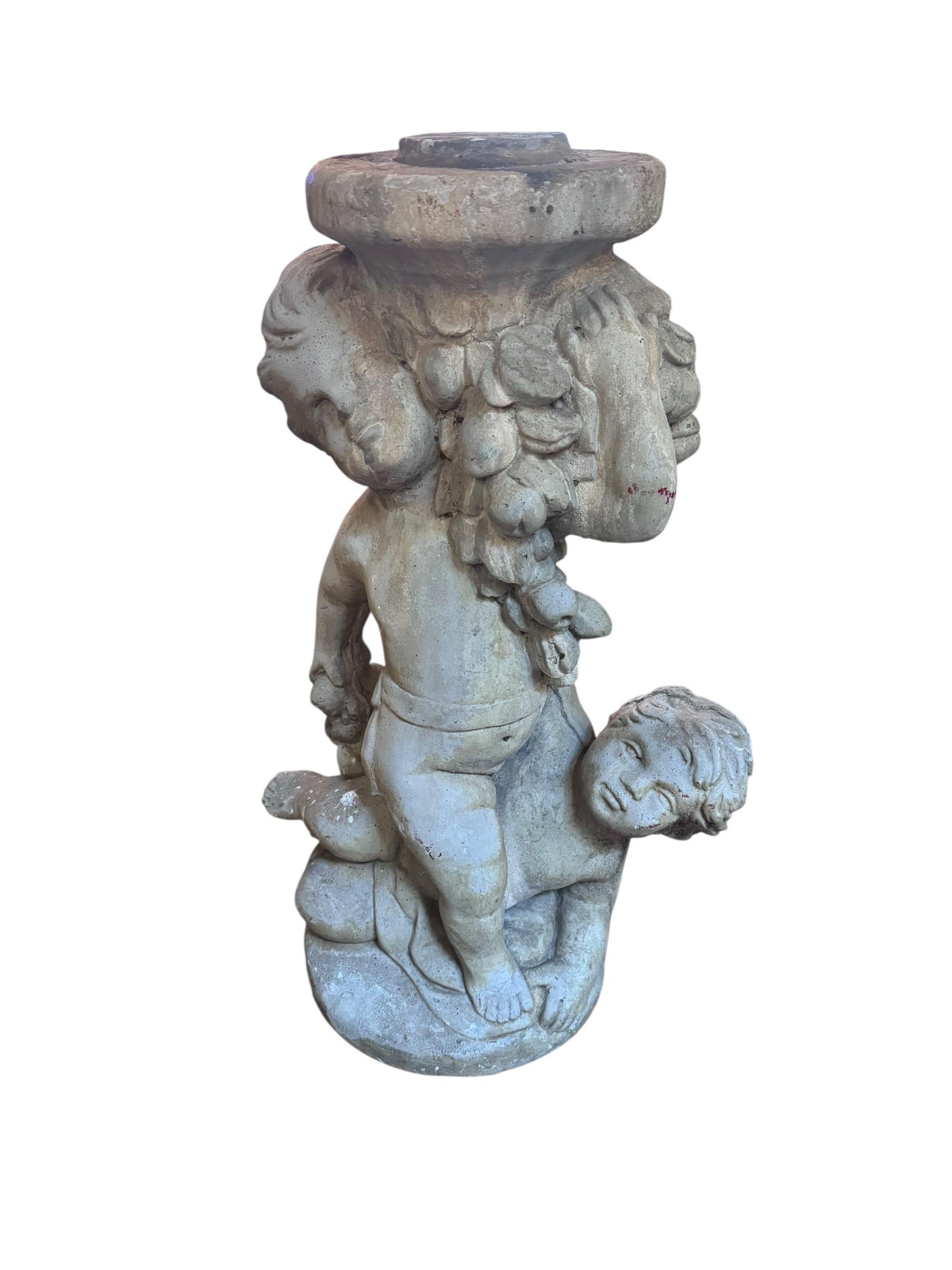 Vintage Neoclassical Style Cherub/Putti Garden Sculpture

This Neoclassical style sculpture features two cherubs with one seemingly carrying/supporting the other. This sculpture is great for a garden or a decorative element in a home.

Circa Early