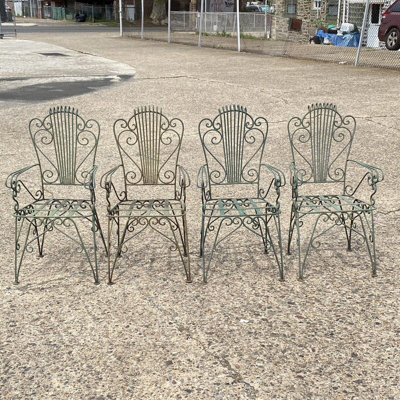 Vintage Neoclassical Style Green Wrought Iron Lyre Harp Garden Chairs - Set of 4. Circa Mid to Late 20th Century. Measurements: 40