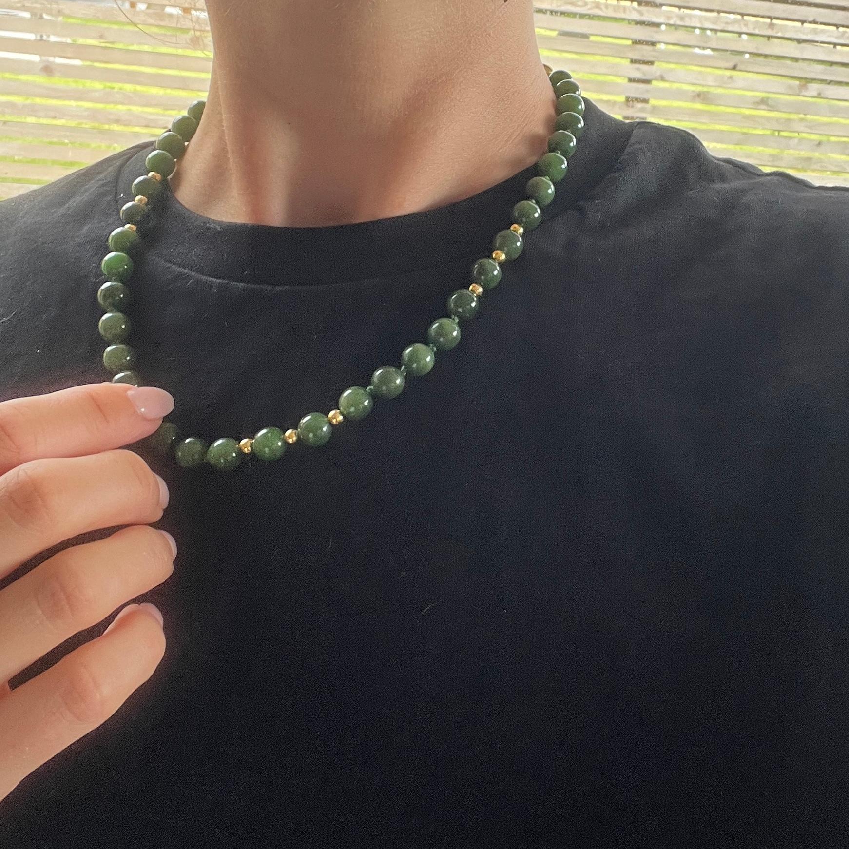 The glossy Jade beads are beautiful broken up with smaller 9 carat gold beads in-between them. 

Length: 45cm

Weight: 41.1g