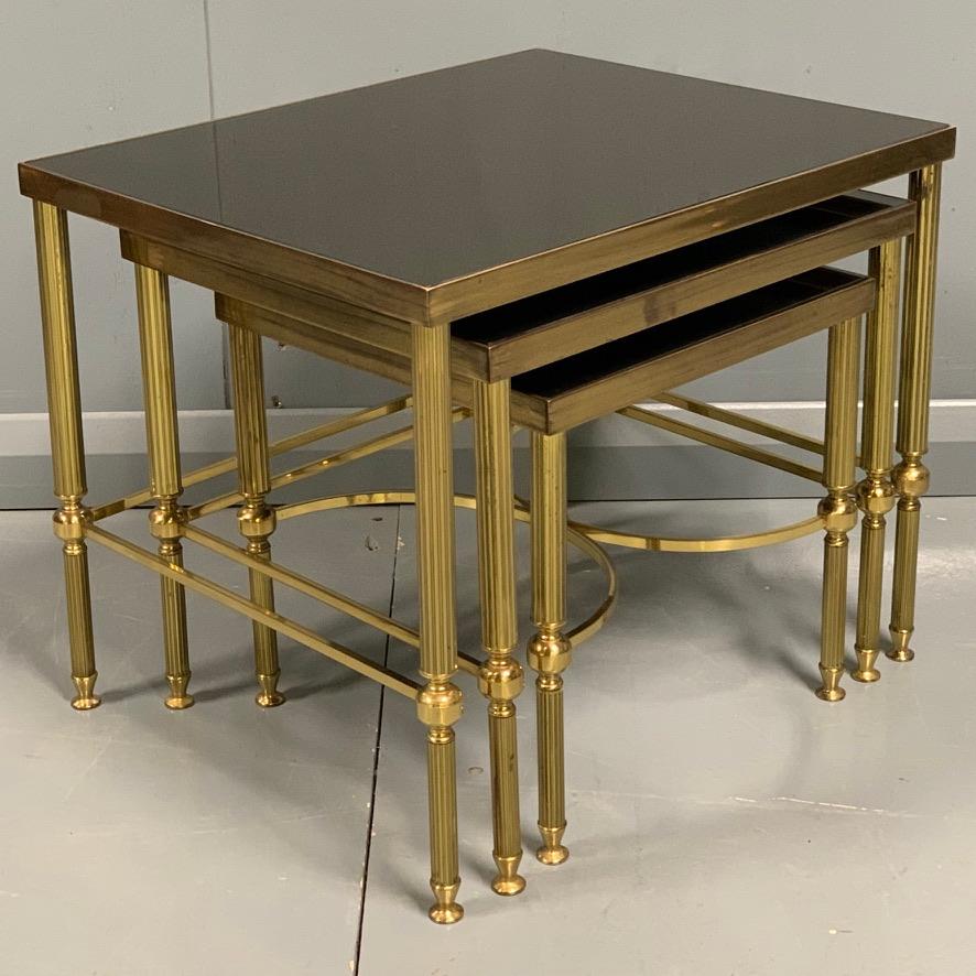 Vintage Nest of 3 Brass and Dark Glass Tables in the Style of Maison Jansen In Good Condition For Sale In Uppingham, Rutland