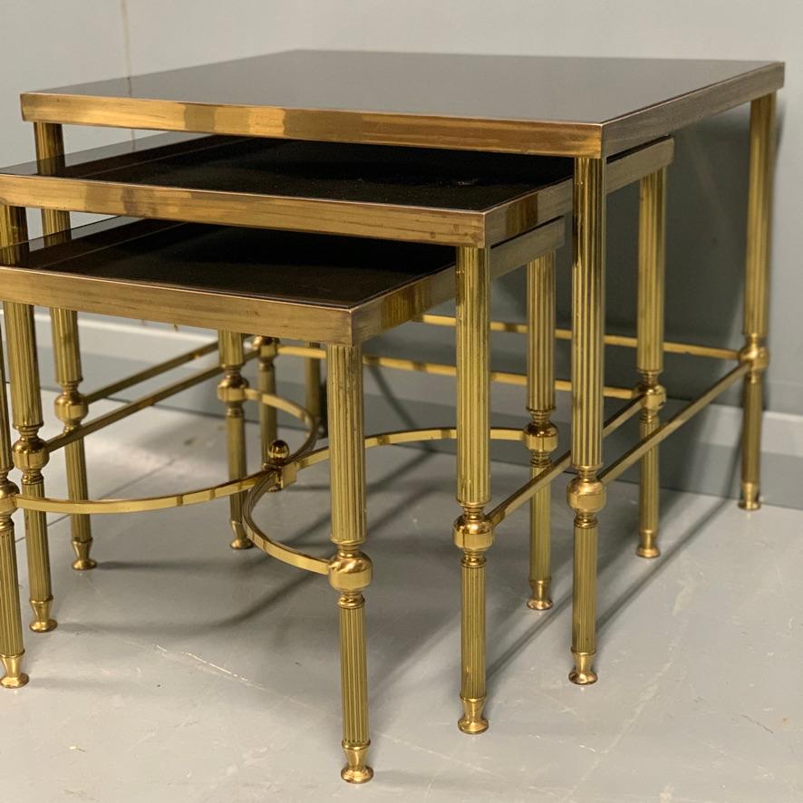 20th Century Vintage Nest of 3 Brass and Dark Glass Tables in the Style of Maison Jansen For Sale
