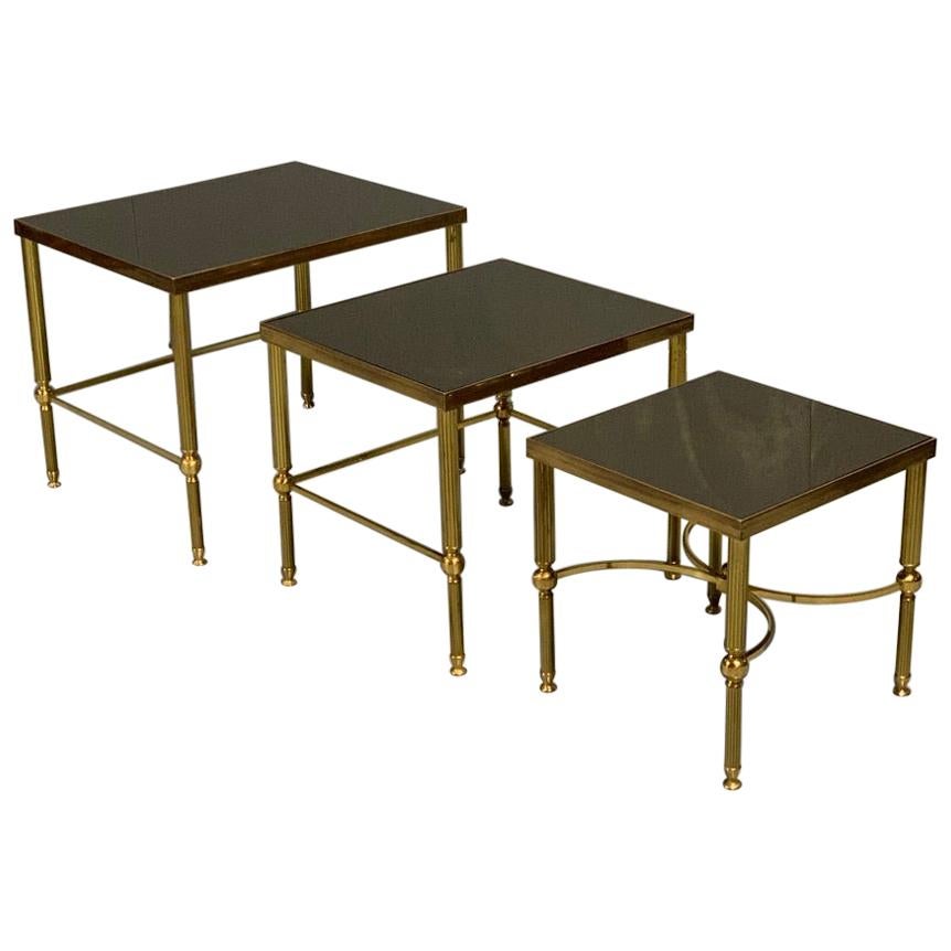 Vintage Nest of 3 Brass and Dark Glass Tables in the Style of Maison Jansen For Sale