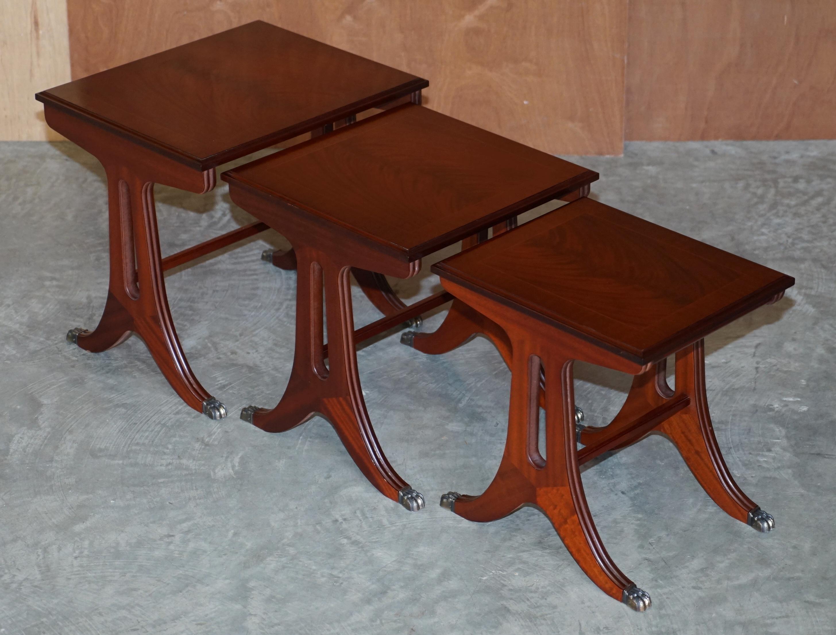 We are delighted to offer for sale this lovely nest of three tables which have flamed mahogany tops and lions hairy paw brass feet

A very good looking and well made nest, the timber patina to the top is very nice, the feet offer a touch of style