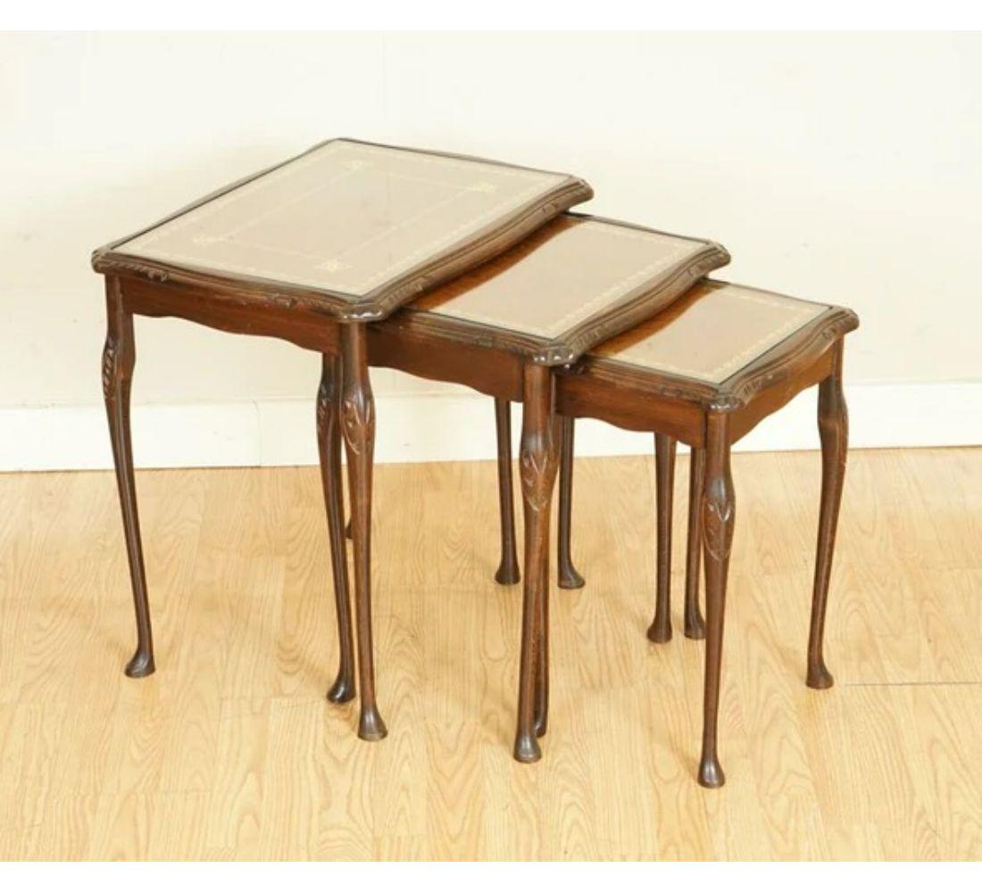 We are delighted to offer for sale a nest of tables with brown leather.

All tables have a glass top to protect the leather. We have lightly restored this by giving it a hand clean, hand-waxed and hand polished

Dimensions:
Table 1: 57 W x 42 D