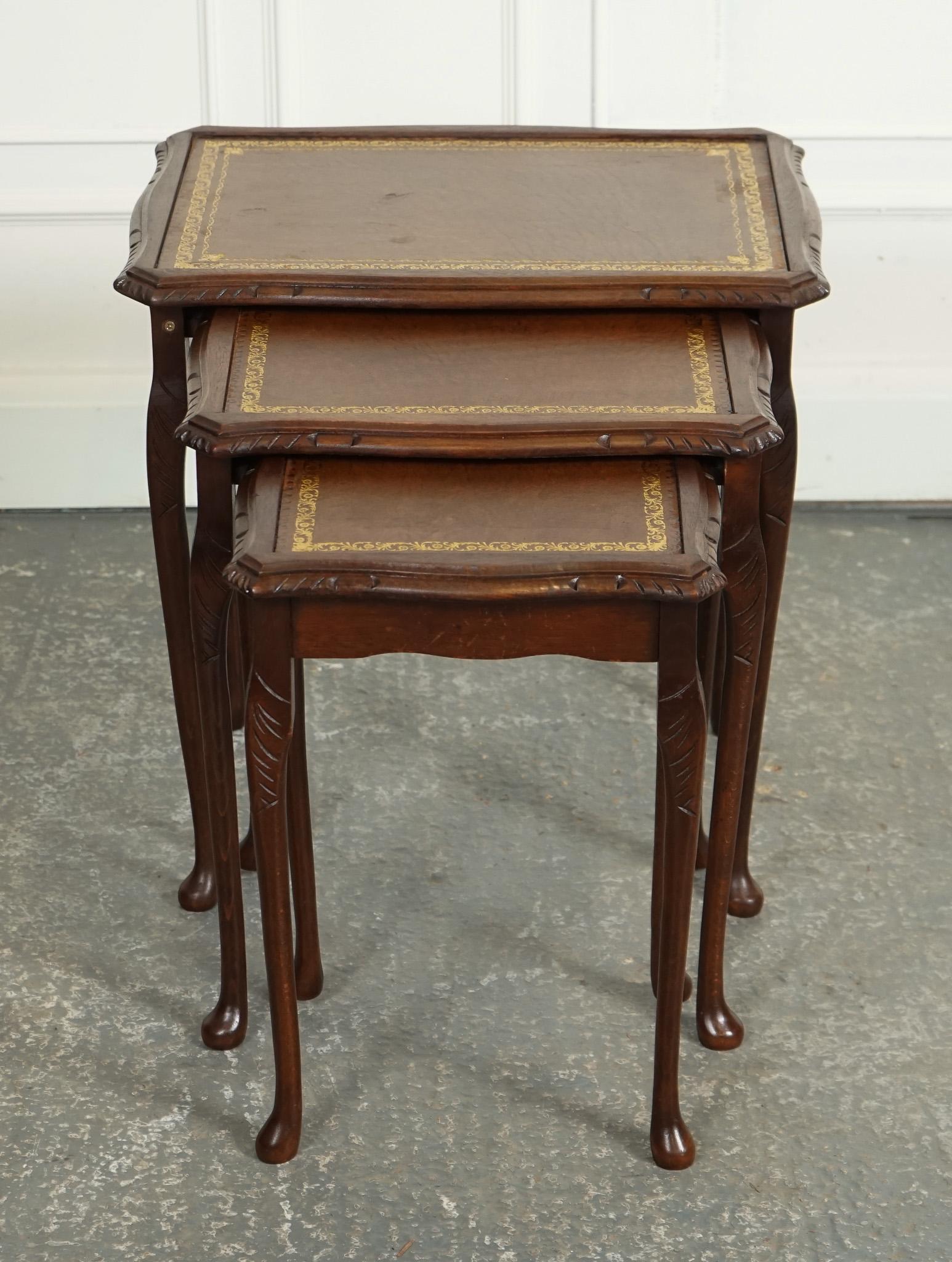 

We are delighted to offer for sale this Vintage Nest of Tables With a Lovely Brown Leather Top.

A charming and elegant piece of furniture designed in the Queen Anne style, known for its graceful curves and refined appearance. The Queen Anne style