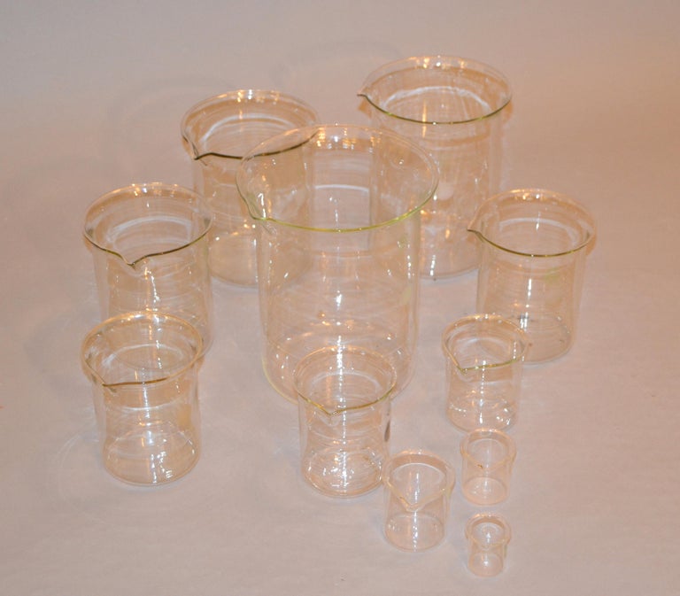 Mid-Century Modern Vintage Nesting Beakers Set Pyrex Glass Graduated Measuring Cups Marked USA For Sale