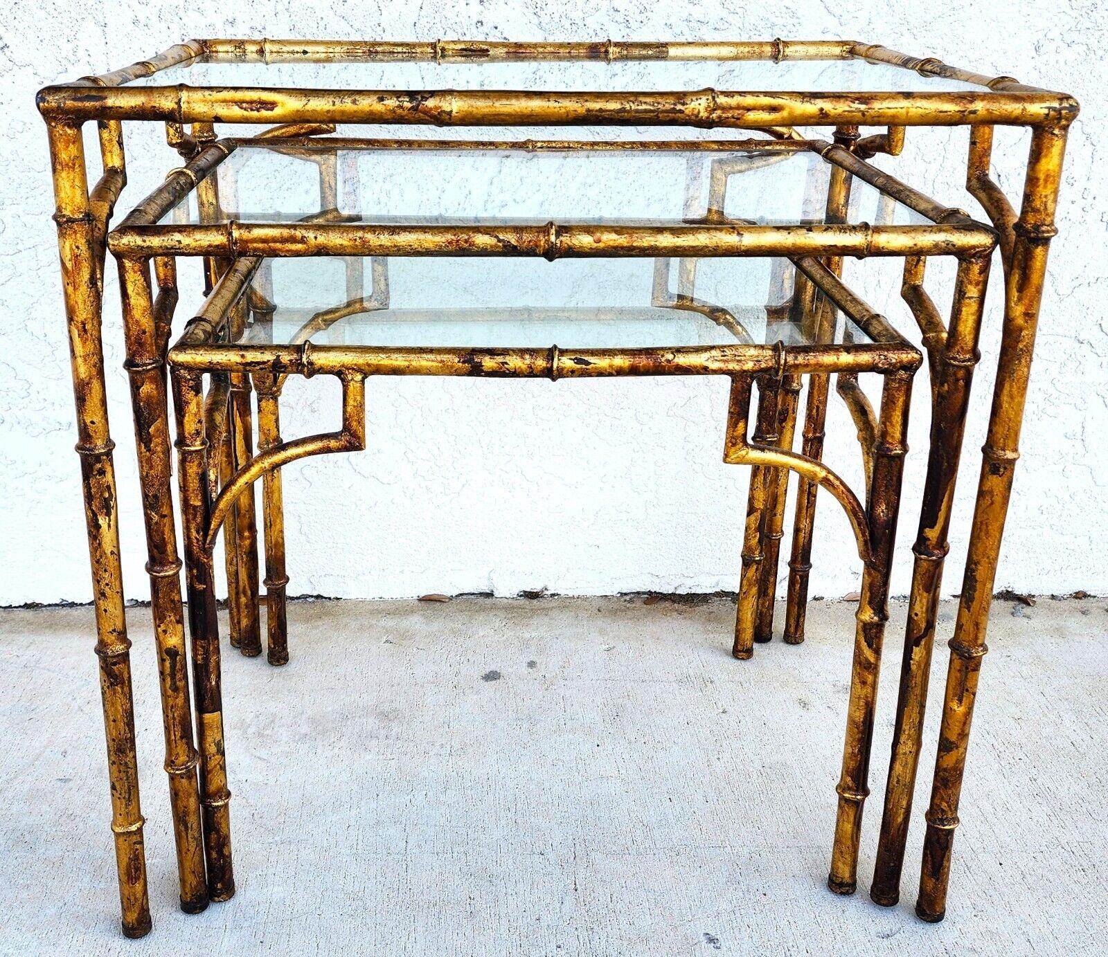 For FULL item description click on CONTINUE READING at the bottom of this page.

Offering one of our recent Palm Beach estate fine furniture acquisitions of a
set of 3 vintage 1960s gilded faux bamboo metal nesting tables
Approximate measurements