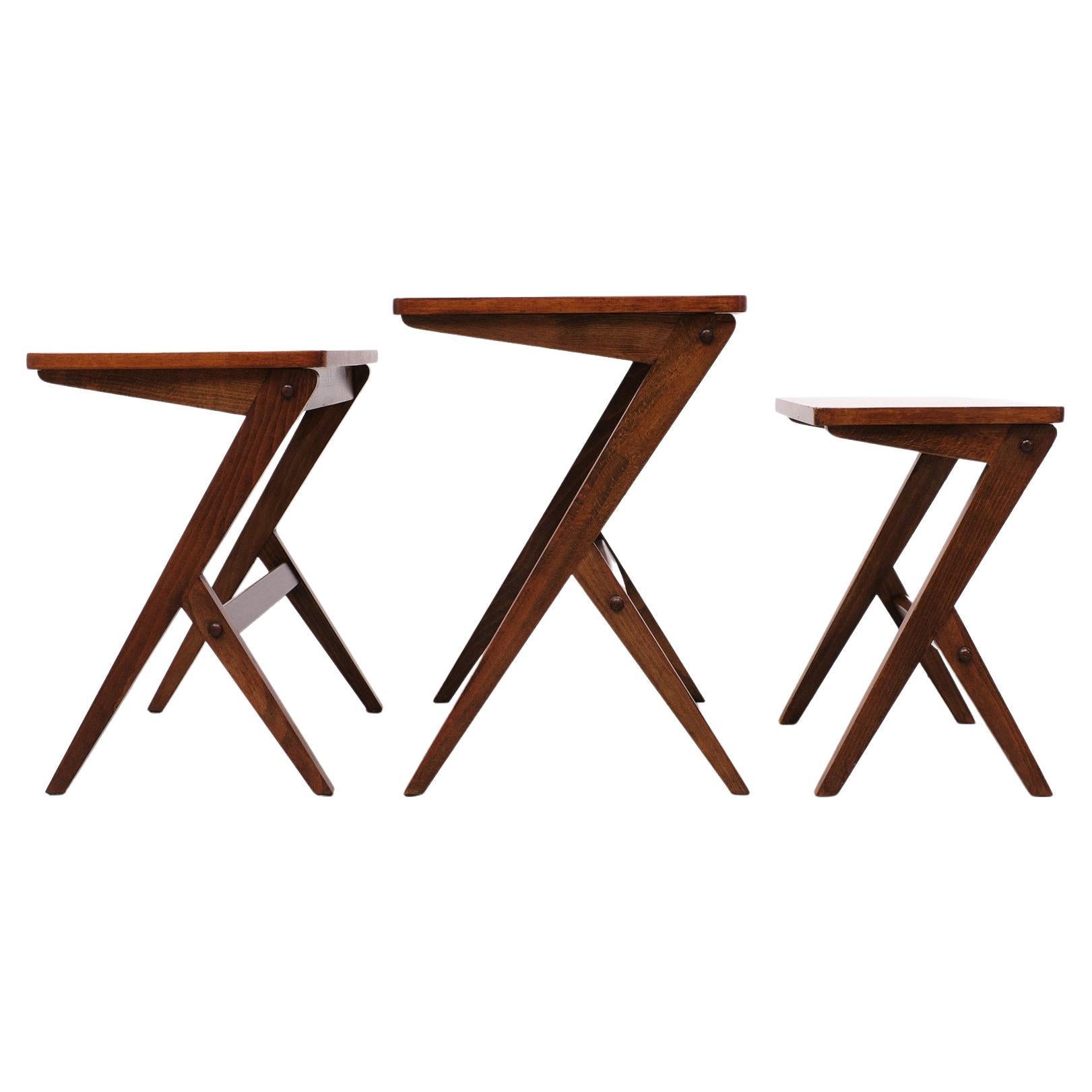 Very nice set of three tables with scissor legs featuring walnut tops and oak frames.
 by iconic Swedish architect & designer Bengt Ruda. for NK (Nordiska Kompaniet) Exceptional examples with fabulous form & shape. 