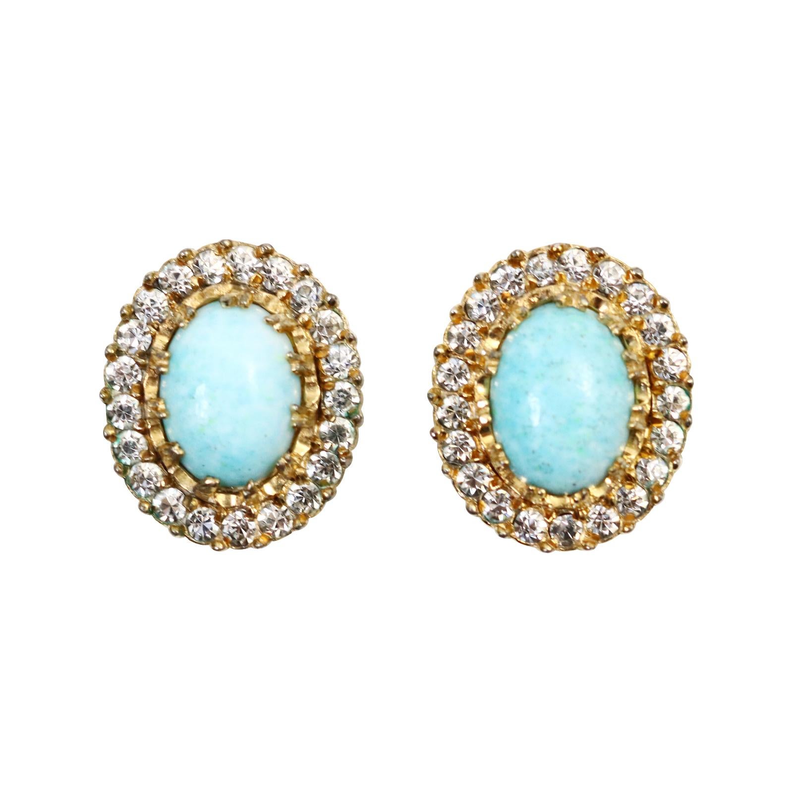 Vintage Nettie Rosenstein Faux Turquoise Diamante Earrings Circa 1960s. These are such well made and well designed earrings from the period.  They are set in gold tone with diamante prong set going all the way around in a more petite earring that