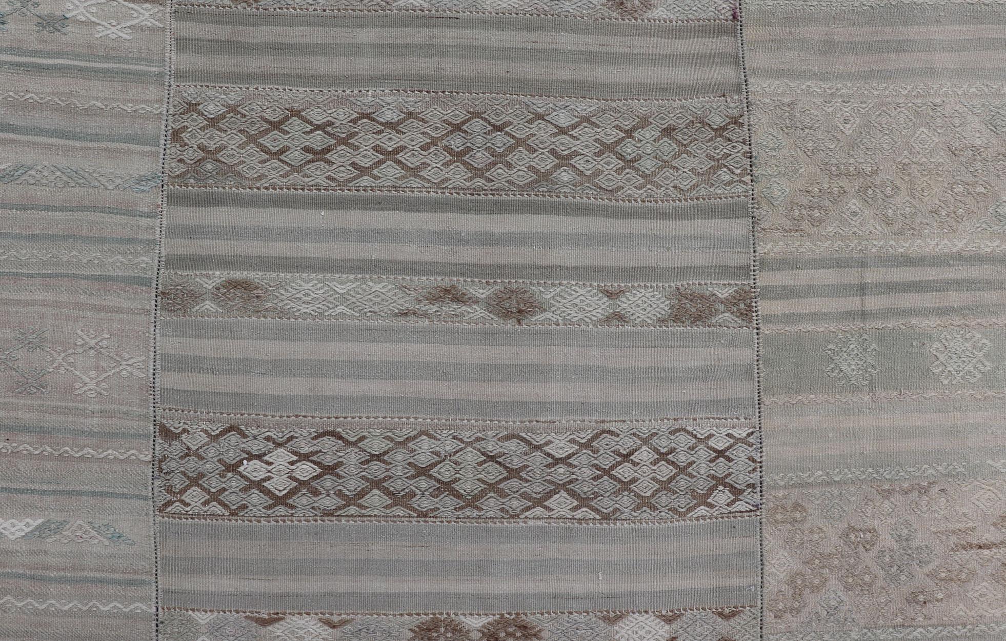 Measures: 10'7 x 16'7 
Vintage Neutral Paneled Kilim Flat-Weave in Neutral Muted Tones. Keivan Woven Arts /rug / EN-14413, country of origin / type: Turkey / Kilim 1950s

Large Vintage Hand Woven neutral paneled Kilim flat-weave. This vintage Kilim