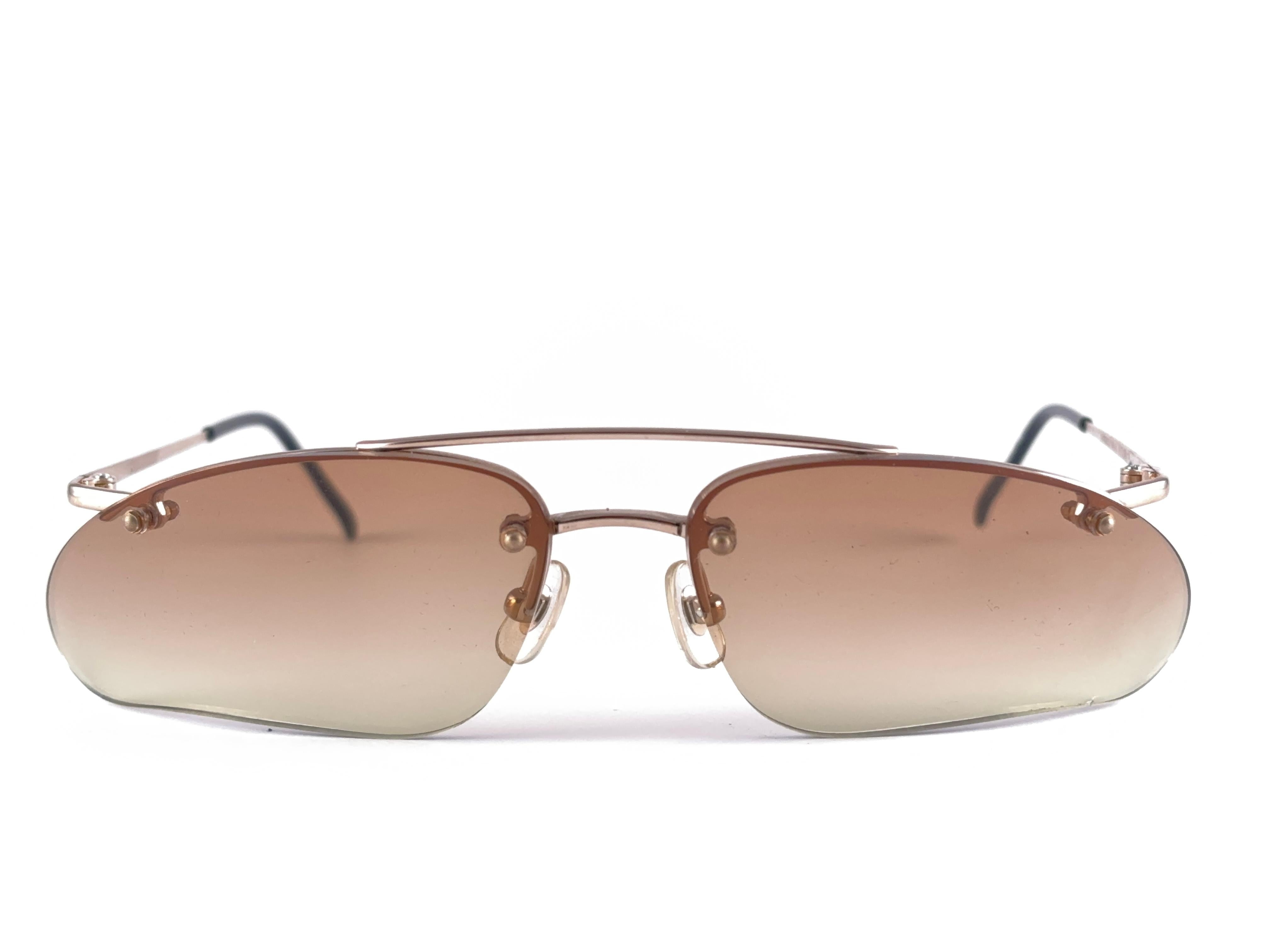 Vintage New Alexander McQueen Titanium Rimless Made in Japan Sunglasses For Sale 1