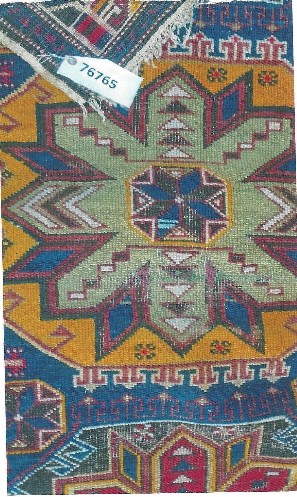 This Shirvan rug (3.2 x 5.10) beautifully combines the intricate craftsmanship of the Caucasus region with a touch of New England cottage charm. Featuring bold geometric medallions and delicate detailing, it evokes a sense of warmth and timeless