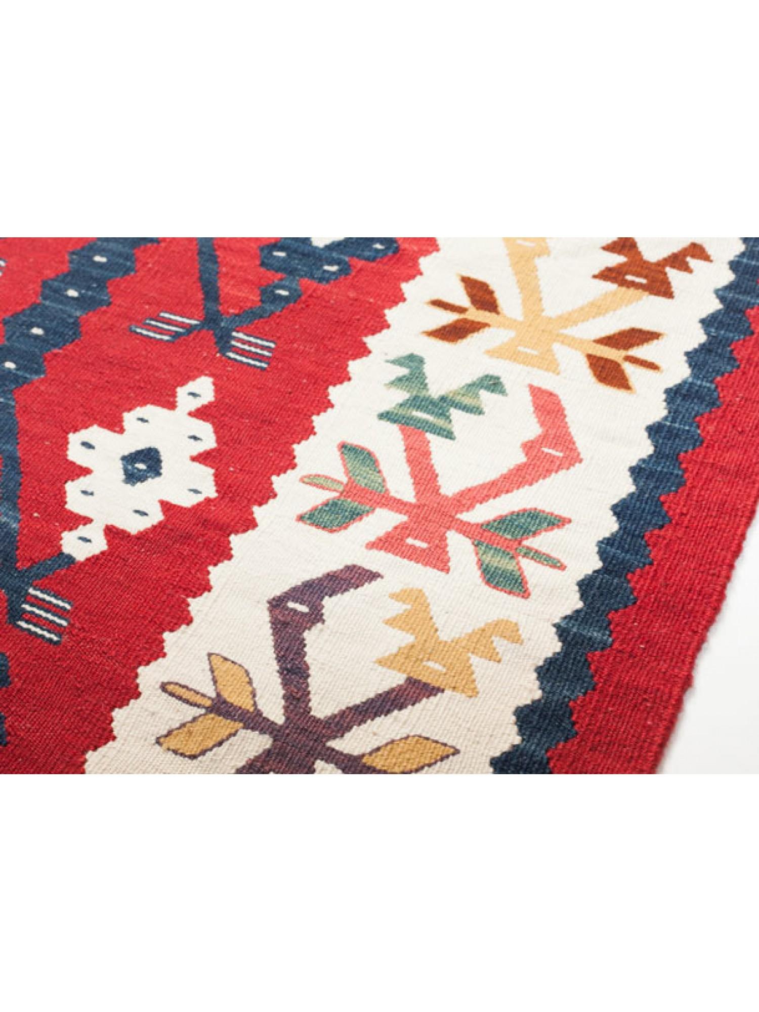 This is a long and thin runner-size, newly woven Sarkoy Kilim from Western Turkey with a rare and beautiful color composition.

We have been dealing with kilims in Turkey for many years, and the new kilims we deal with are made using traditional