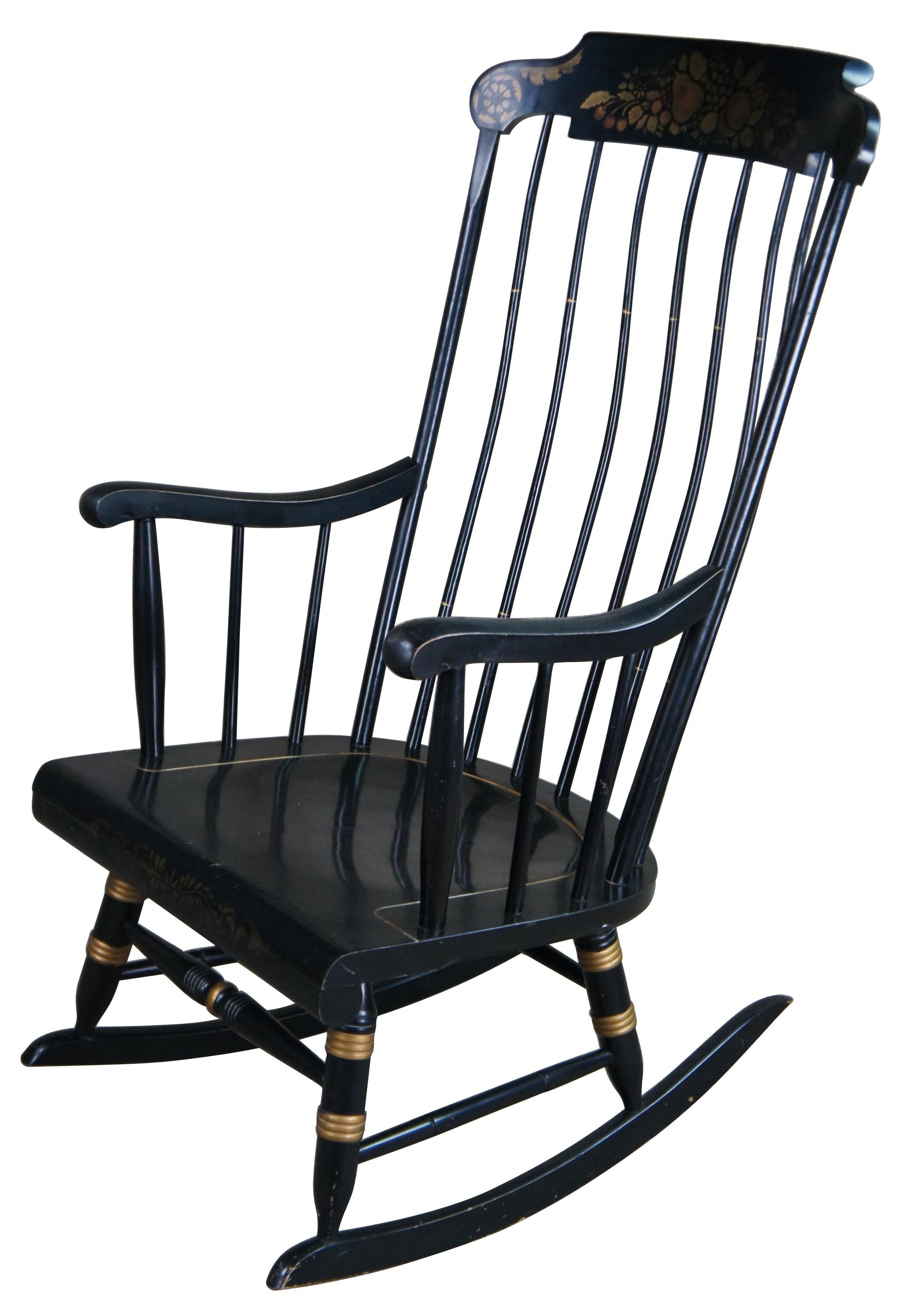 Vintage Nichols & Stone Black Harvest Hitchcock Windsor rocker armchair featuring ebonized finish with gold accents and stenciled fruit. 69 - 6DC.
 