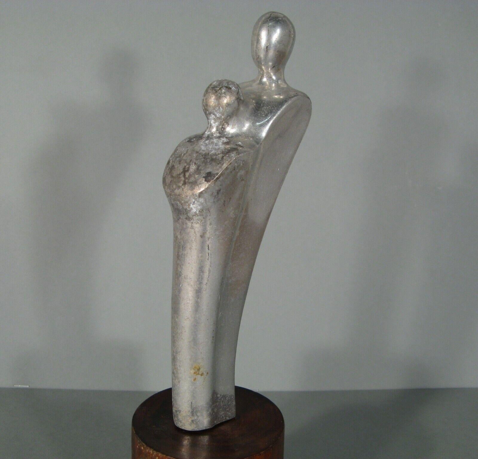 Escultura vintage de metal niquelado: Maternidad estilizada - 1Y101 siglo XX