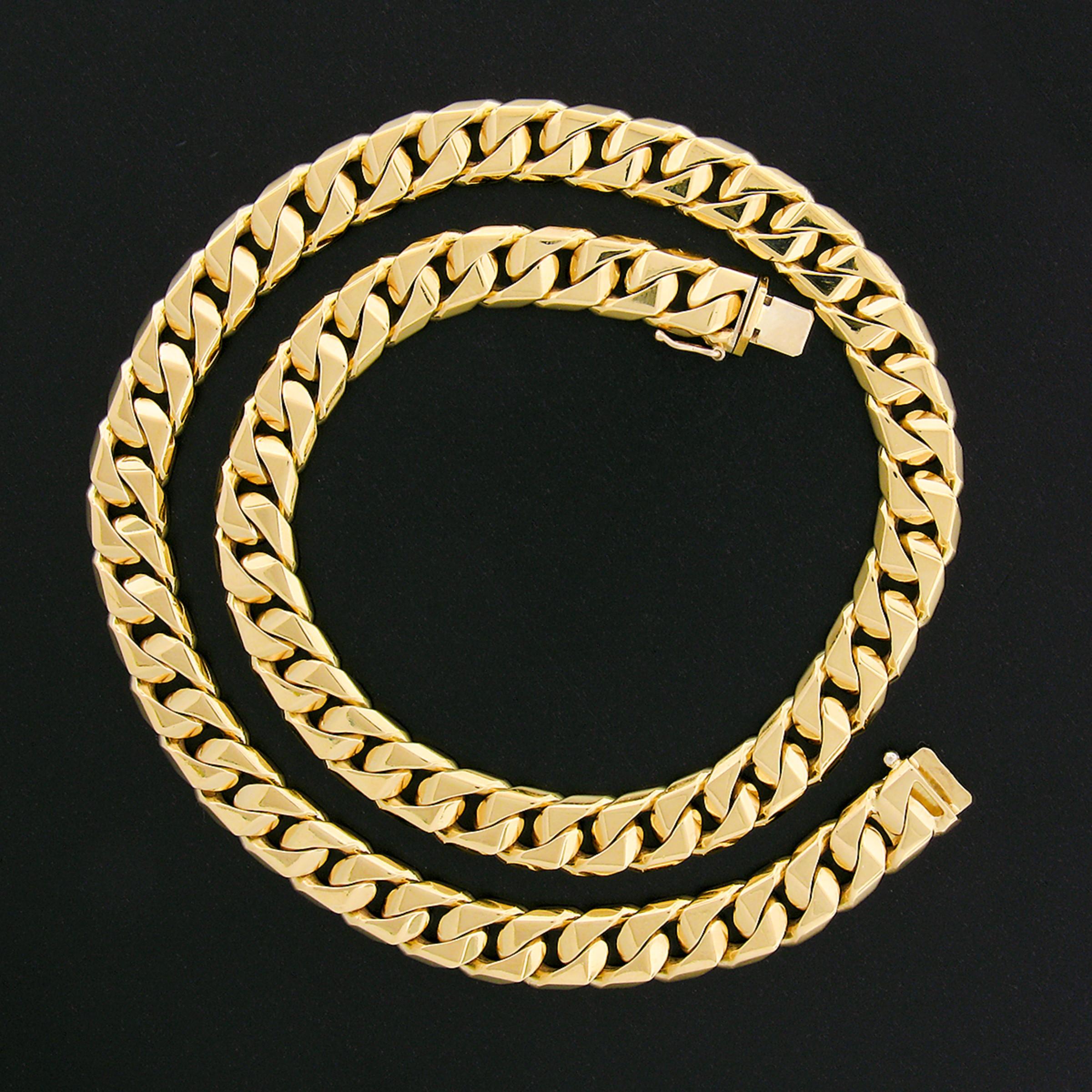 Here we have a vintage Nicolis Cola chain necklace that was well made from solid 18k yellow gold. This very solid Cuban/curb link chain is 9.1mm wide and measures 17.25 inches in length, laying close to the neck and making an absolutely elegant