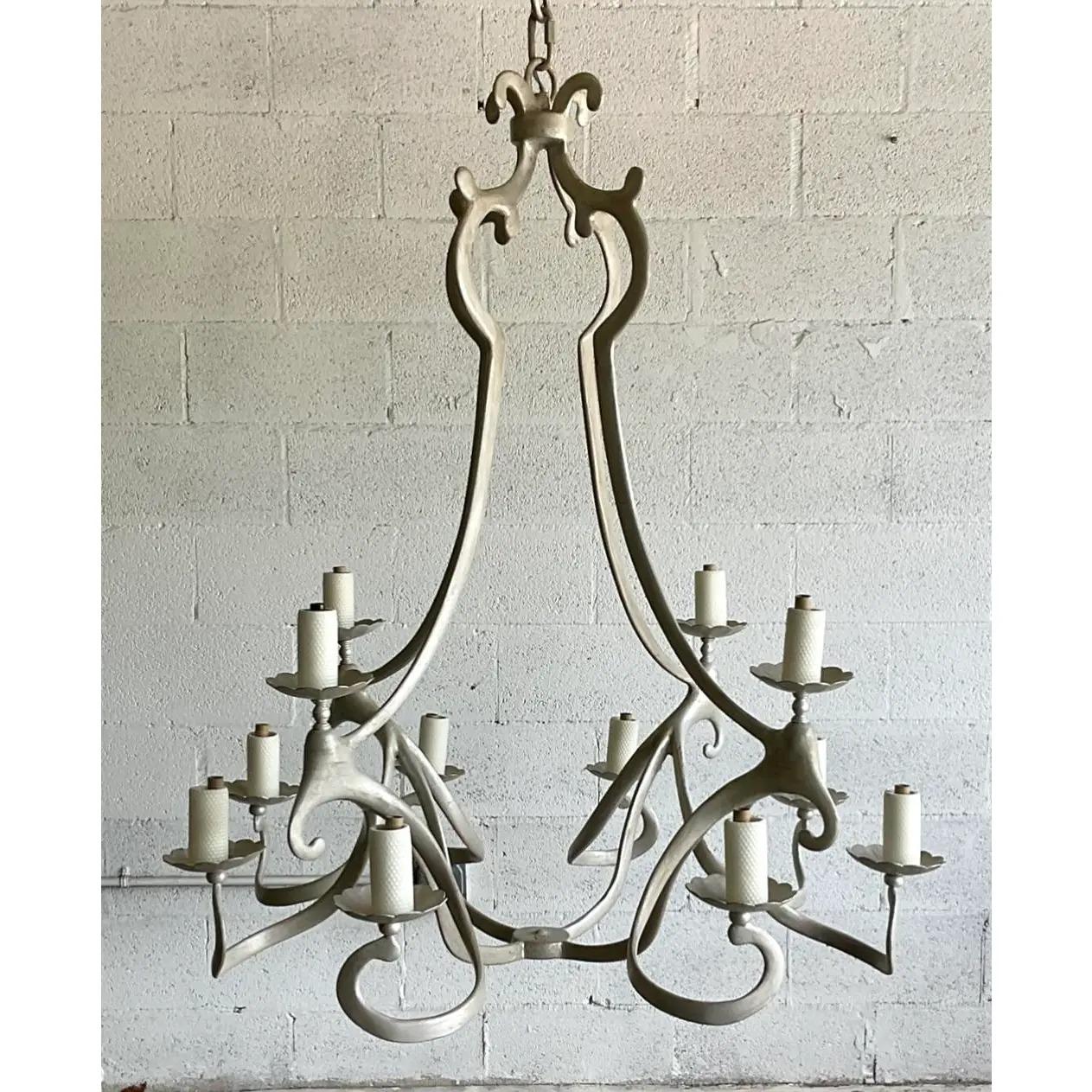 Spectacular vintage Contemporary biomorphic chandelier. Made by the iconic Niermann Weeks group. A 12 arm monumental shape with a Veronese silver leaf finish. Acquired from a Palm Beach estate.

The chandelier is in great vintage condition. Minor