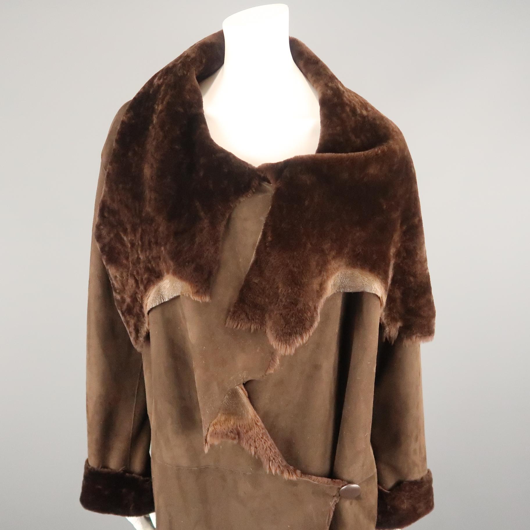Vintage NIGEL PRESTON coat comes in brown shearling suede with a raw cut collar, asymmetrical button closure, and full fur interior. Wear throughout. As-is. Made in Italy.
 
Good Pre-Owned Condition.
Marked: (no size)
 
Measurements:
 
Shoulder: 22