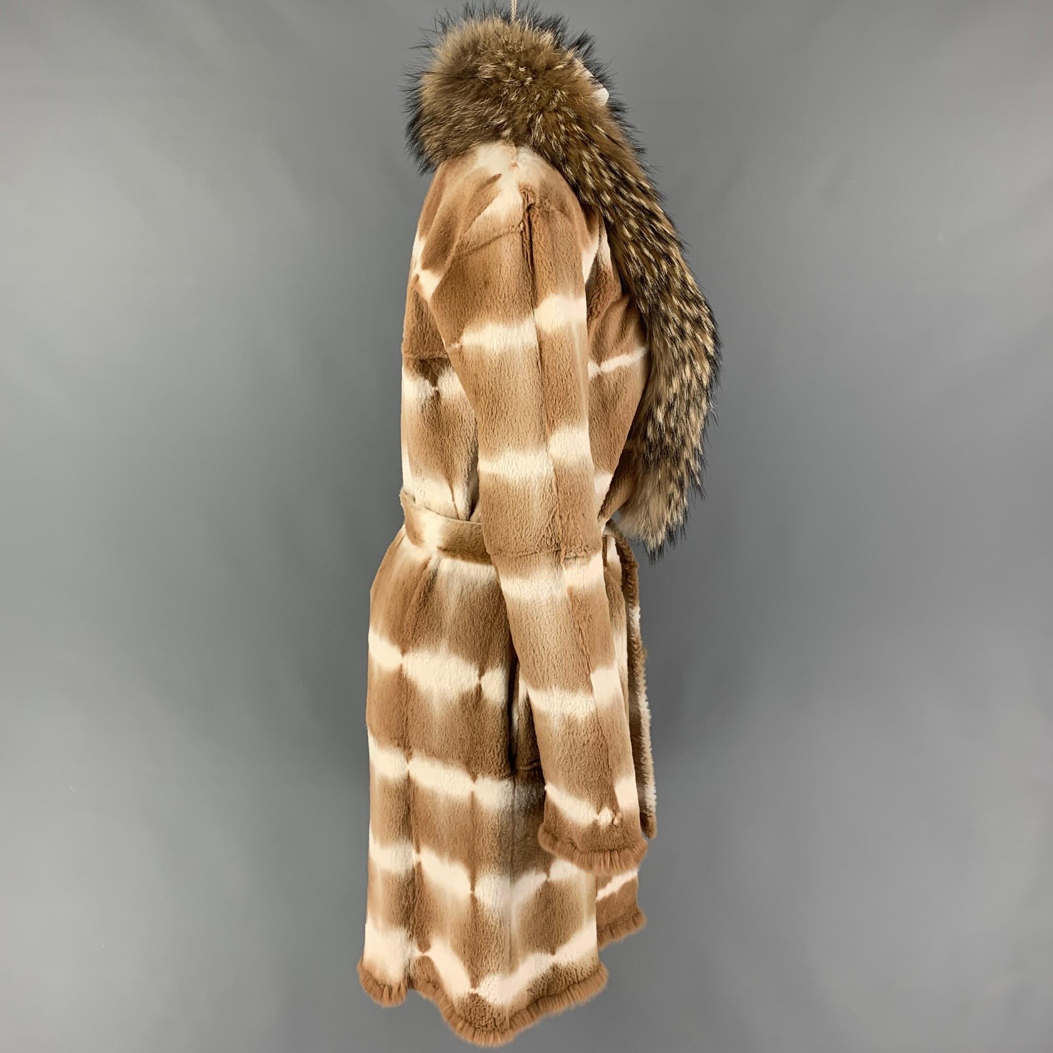 Vintage NIGEL PRESTON coat comes in a tan & cream fur featuring a coyote fur trim, belted, slit pockets, and a single button closure. 

Good Pre-Owned Condition. Light wear. As-Is.
Marked: M
Original Retail Price: $4,500.00

Measurements:

Shoulder: