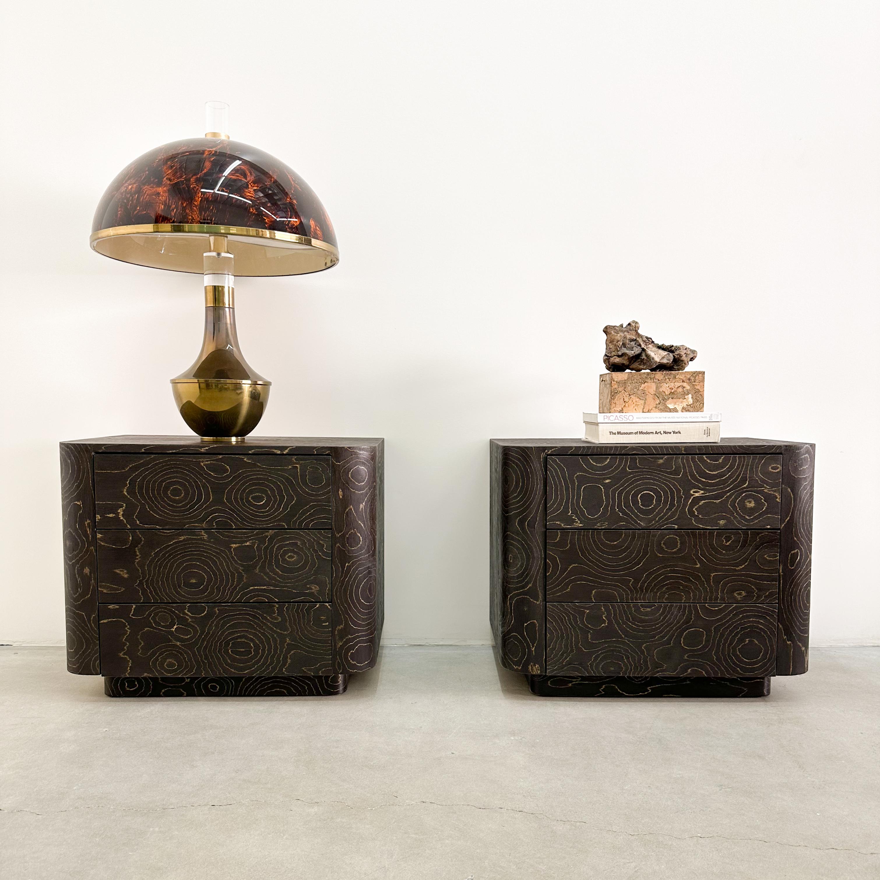 Pair of Vintage Nightstands Featuring Estudio Campana Veneer By ALPI.

The vintage nightstands have been re-veneered with the original Estudio Campana Veneer.
ALPI manufactures the distinctive veneer. It has been sealed with a satin finish for added
