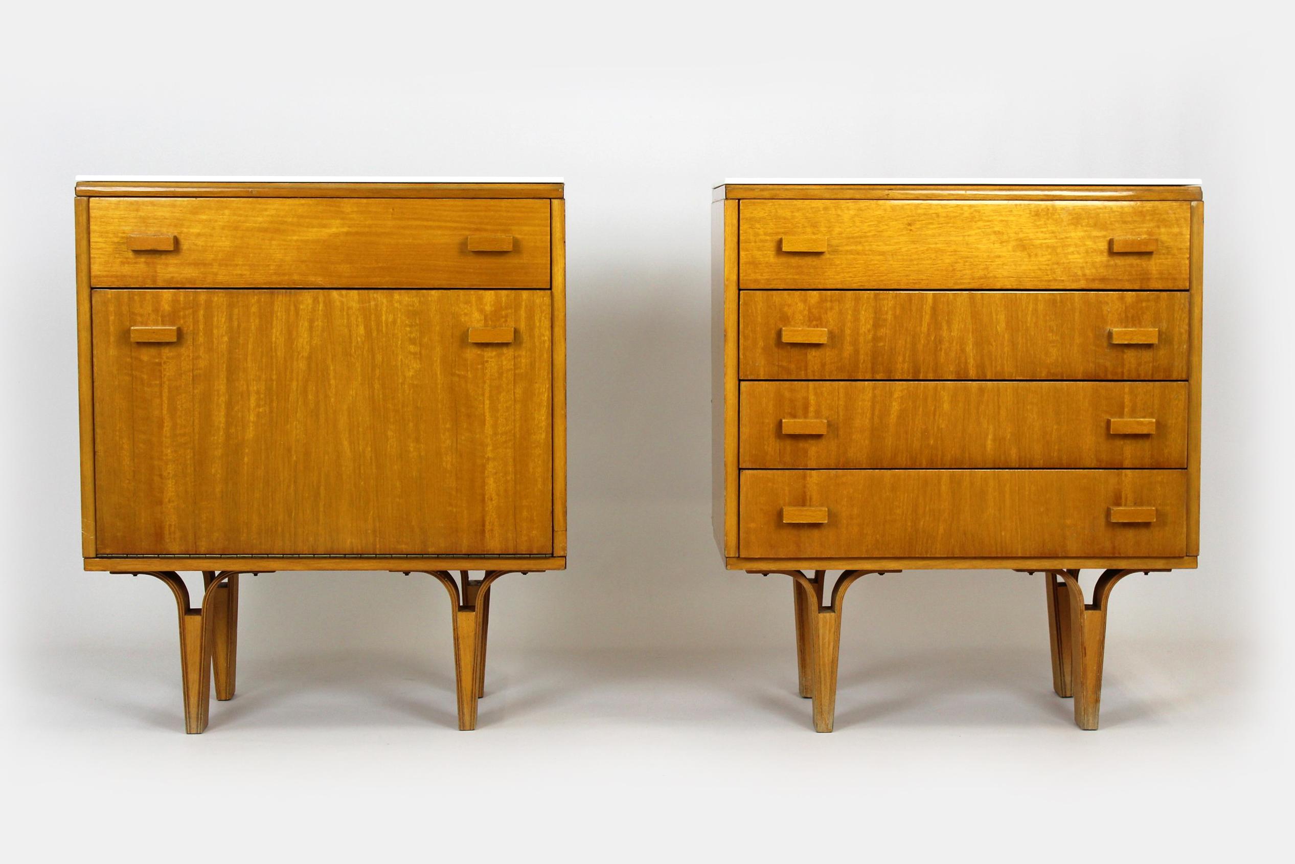This pair of vintage bedside tables was manufactured in the 1960s/1970s by Nový domov NP (Czech Republic). The legs are made of bent plywood, the cabinets have white glass tops.
Original, good condition.
