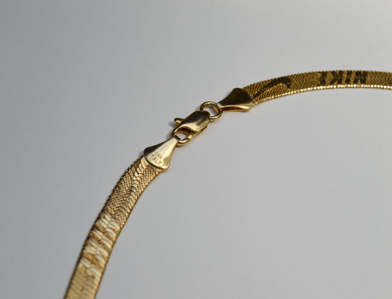 Vintage Nike Logo 14 Karat Gold Herringbone Chain Necklace at 1stDibs | nike  gold chain, nike herringbone necklace, 14k gold nike necklace